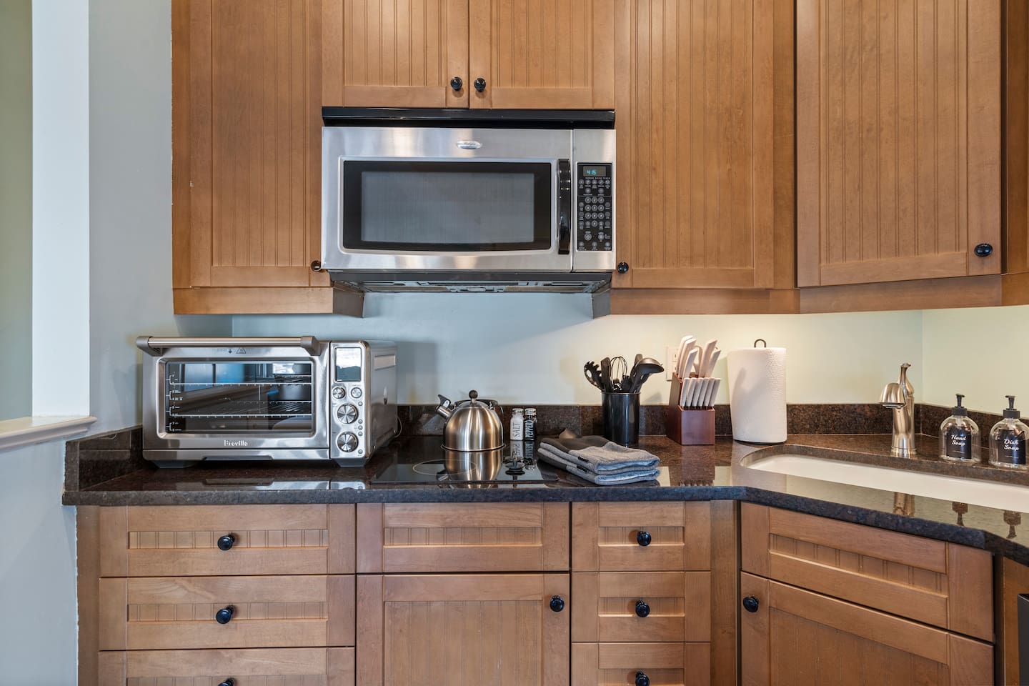 Full-size countertop Smart oven (holds a 13# turkey!) and stainless microwave — a proper kitchen in a perfectly sized space