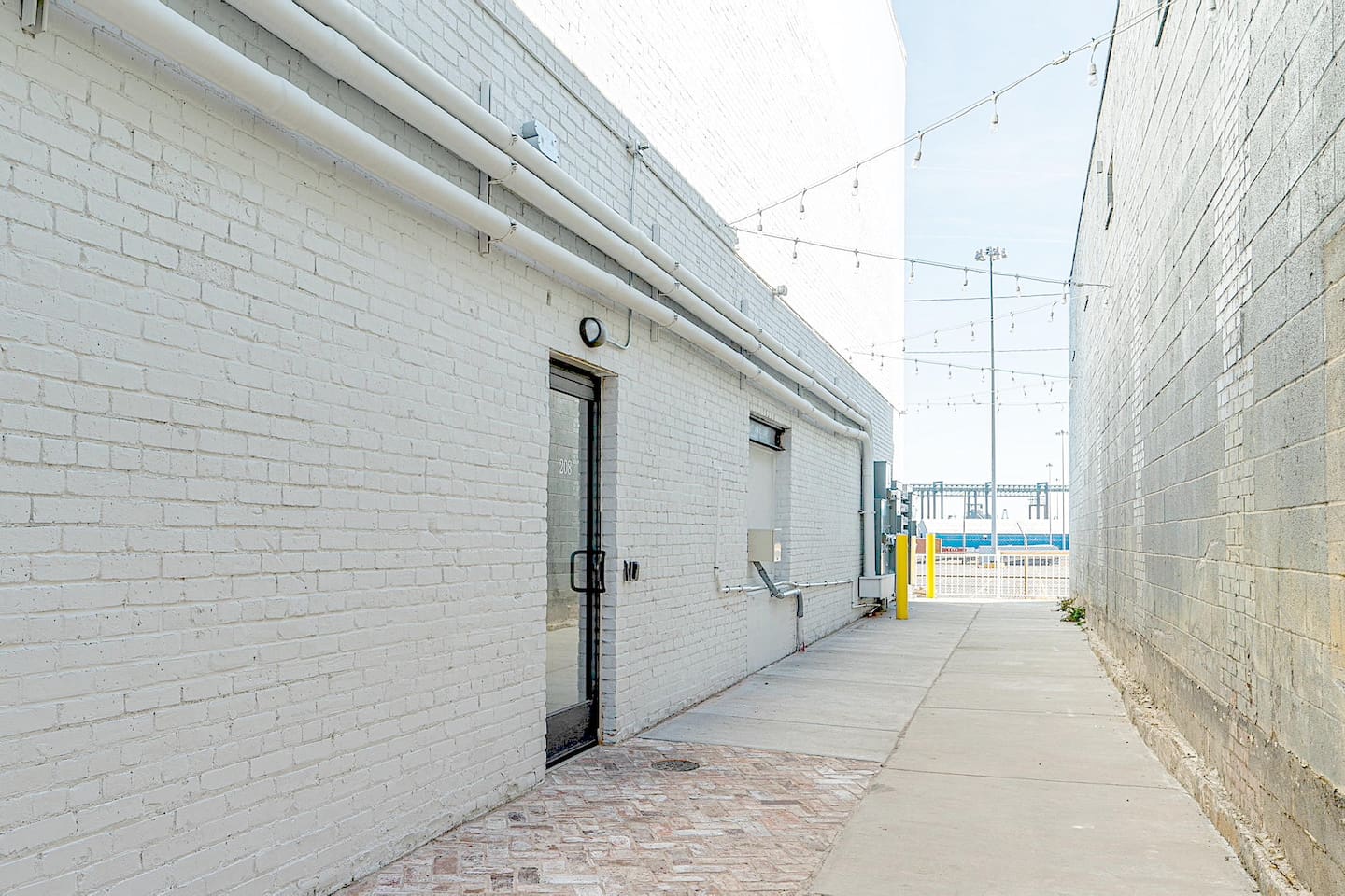 Well lit-side entrance with key pad lock