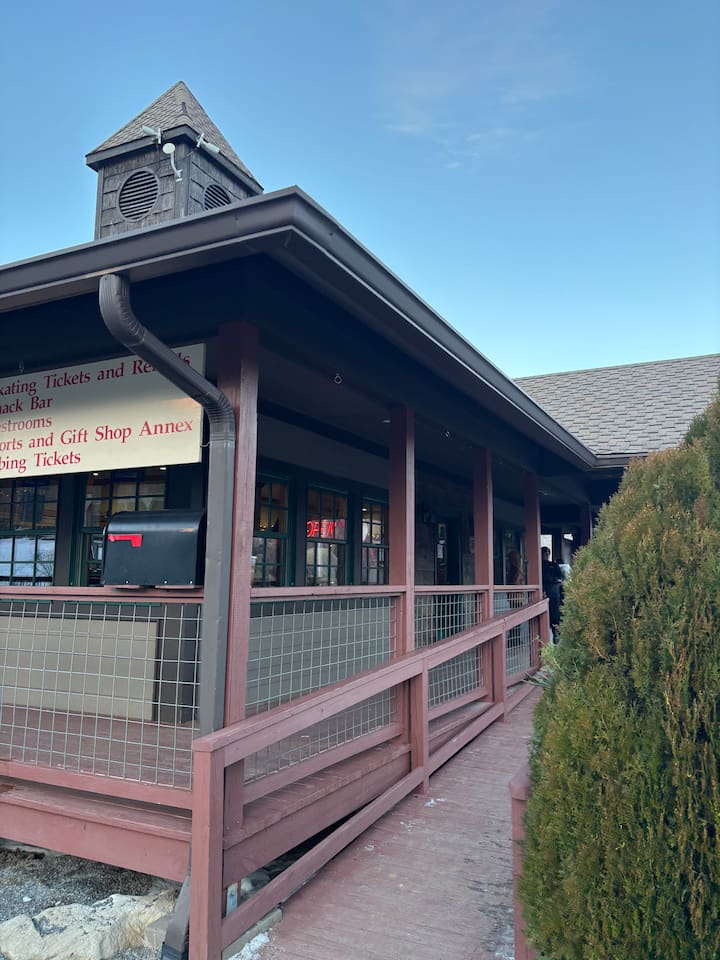 Clubhouse... During the winter the clubhouse becomes your stop for getting your ice skating tickets and skates.  During the summer you are walking distance to the Clubhouse  for Golf and Clay Tennis courts. 