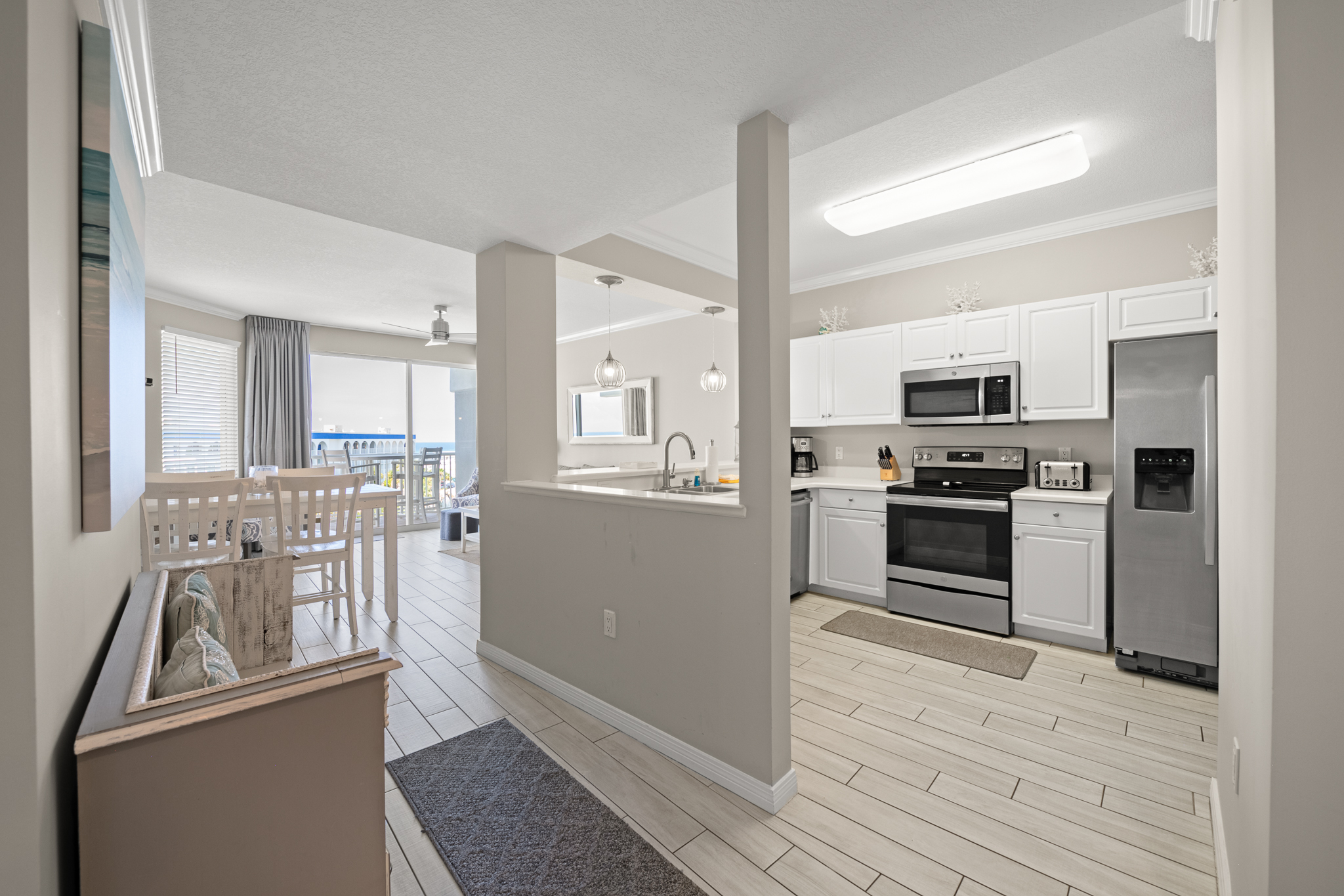 Open kitchen, dining & living area designed for easy time together.