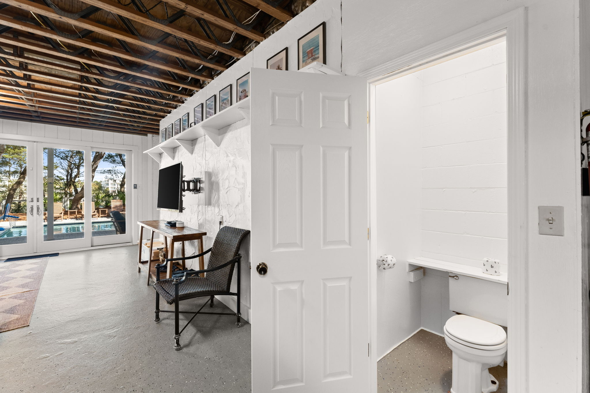 No tracking water upstairs! Use the convenient lower-level lounge, side A half bath.