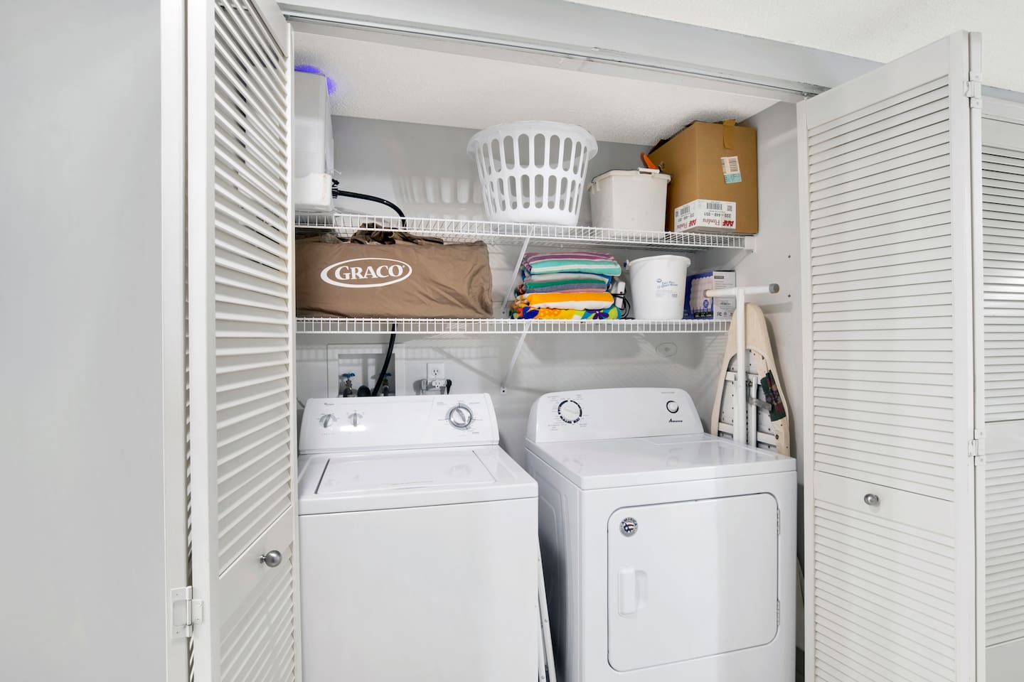 Standard-sized Washer + Dryer - 1 load Detergent provided! You'll also find the beach towels here above the dryer, as well as the pack 'n' play.
