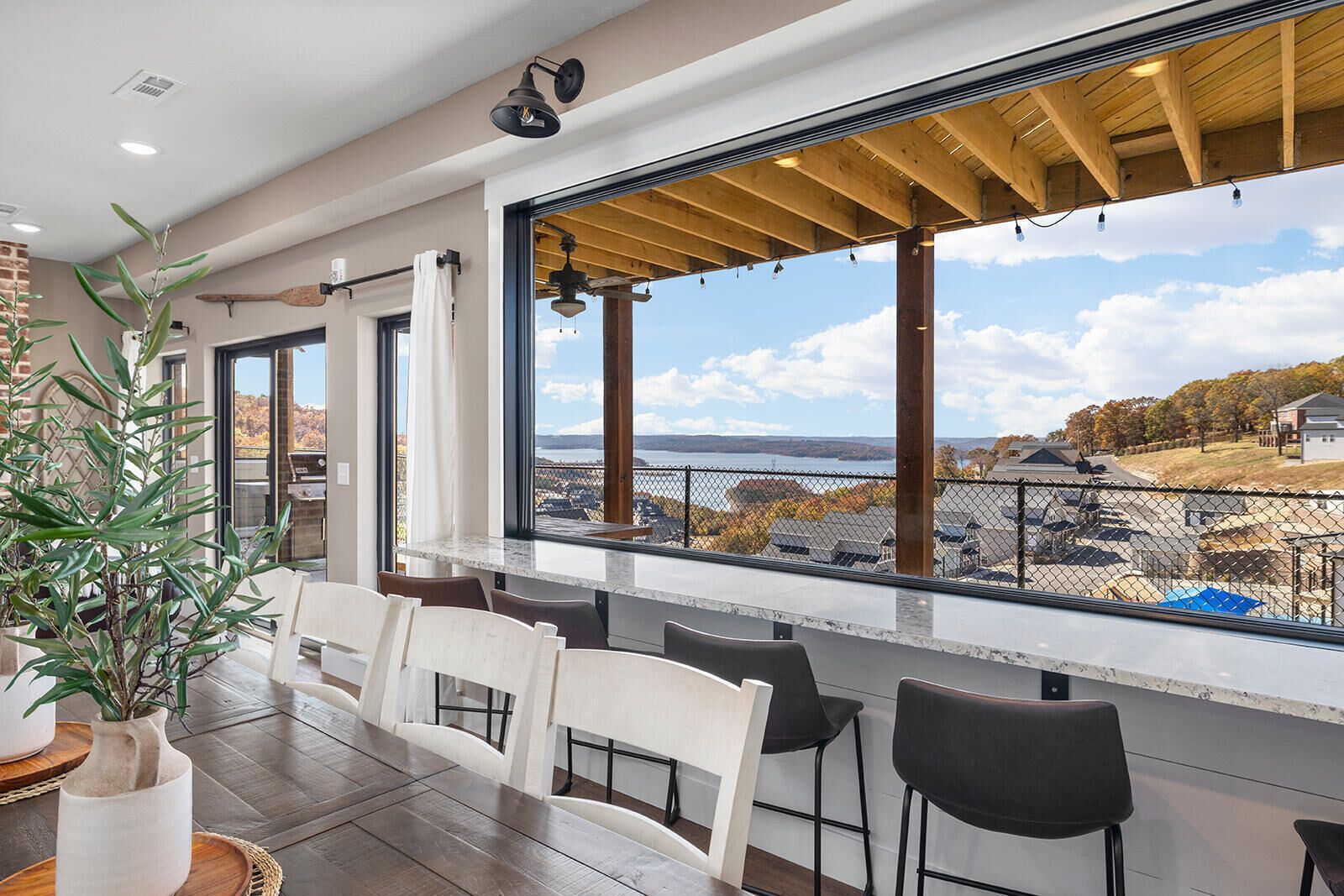 Main Level large window with bar overlooking amazing lakeview