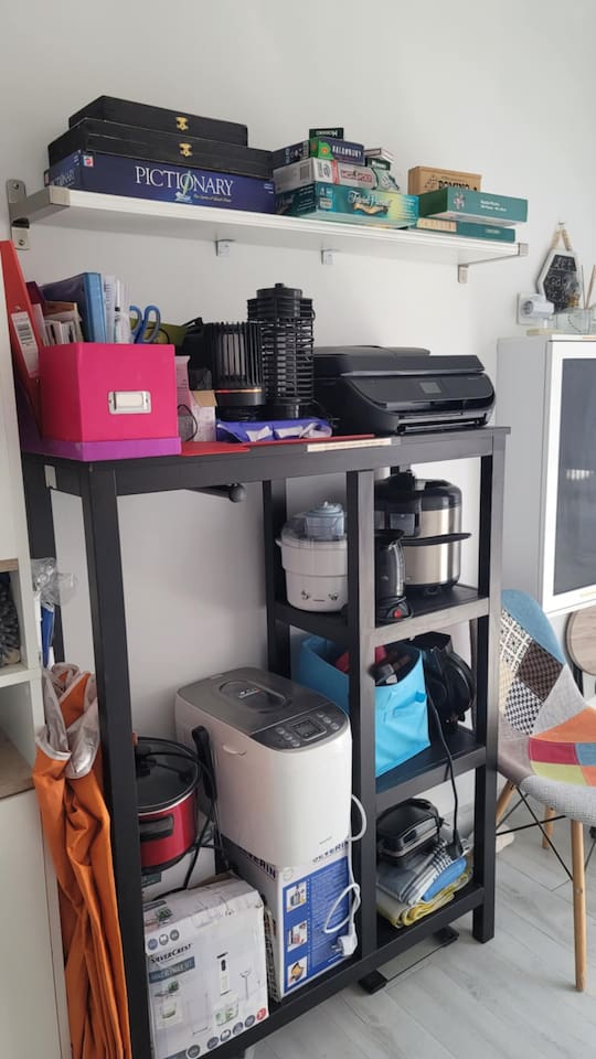 This is a common area shared between 2 apartments.  It has additional cookware, laundry facilities, items for the beach, games, emergency supplies, etc.