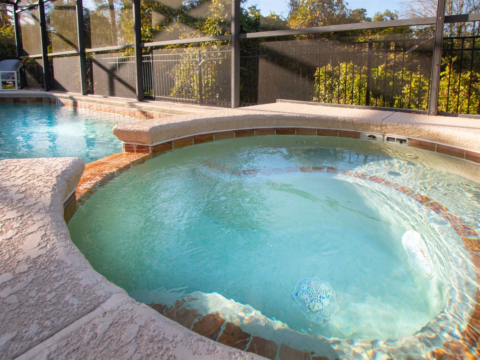 Hot Tub connected to Private Screened Patio Pool.