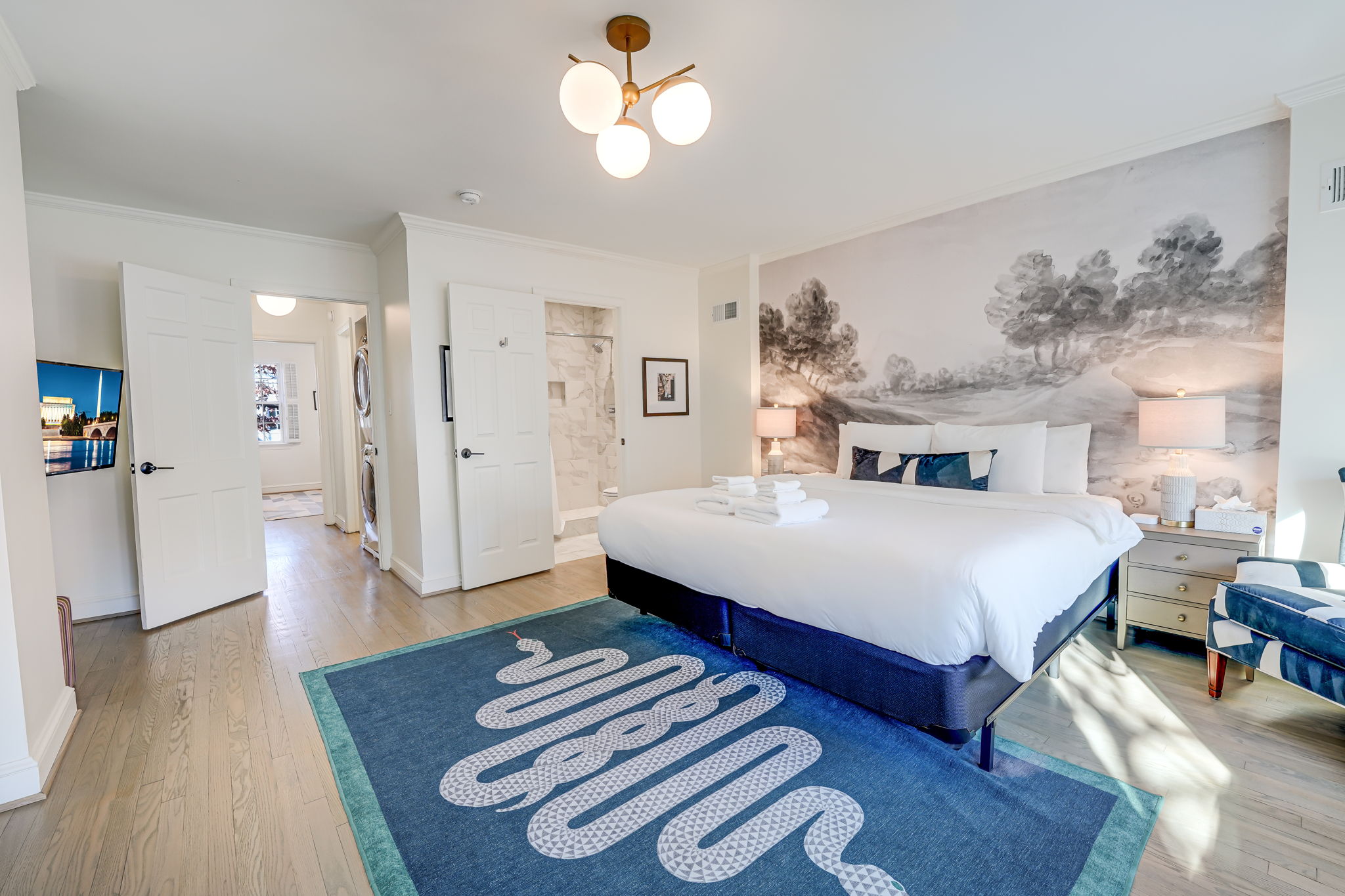 Main Bedroom with Ensuite Bathroom: King Bed, 40" Samsung UHD 4K TV.