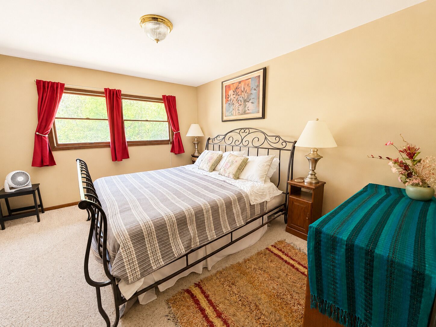 A spacious king bedroom designed for a restful night's sleep.