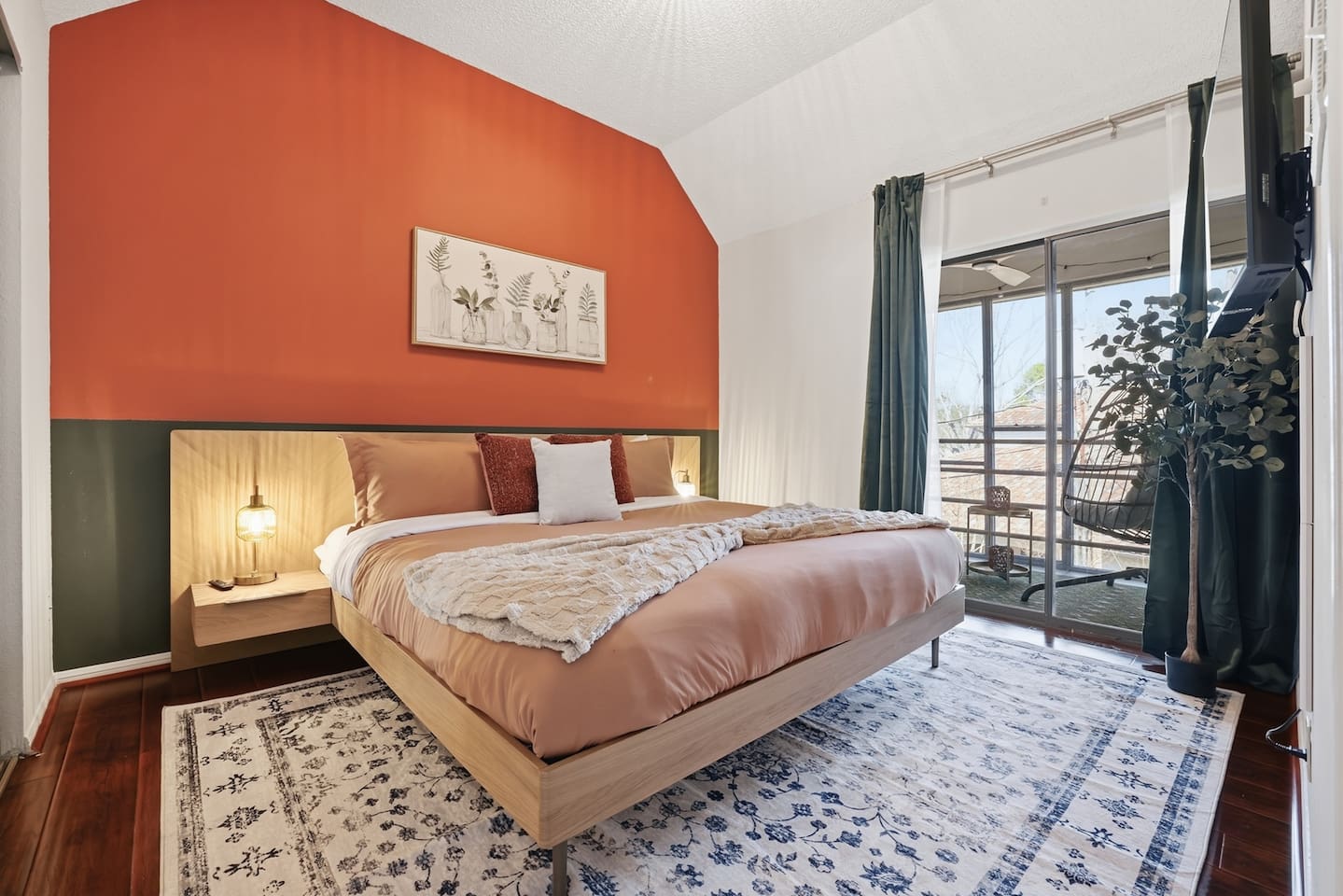 Bedroom with King Bed, 43" TV, closet and Balcony access