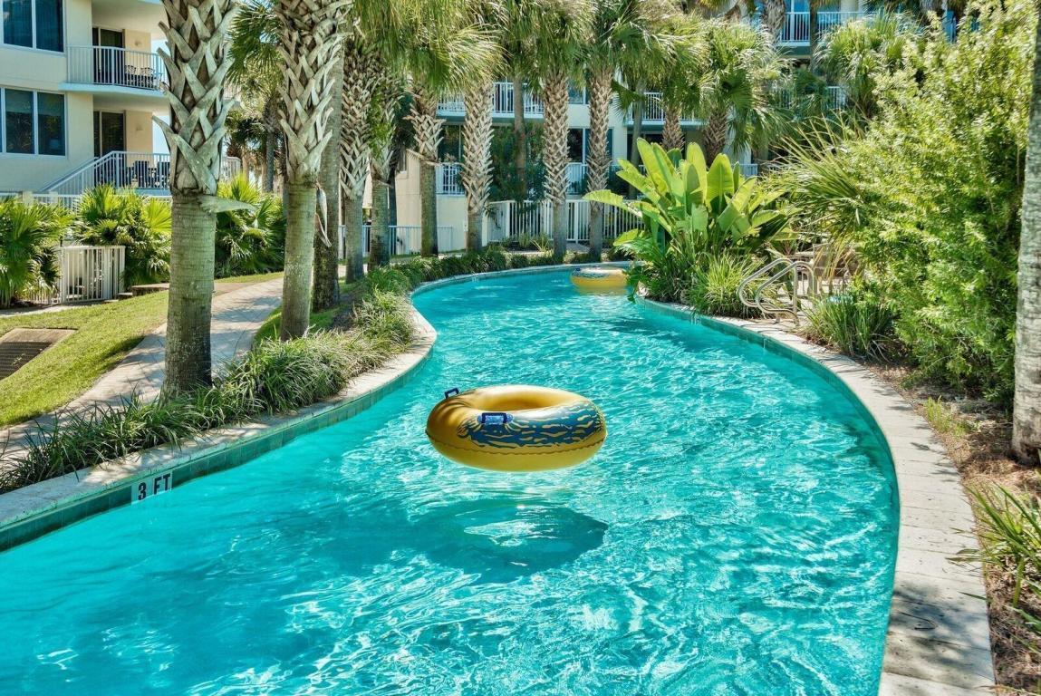 Lazy river drifting through lush landscaping, made for slow, easy days.