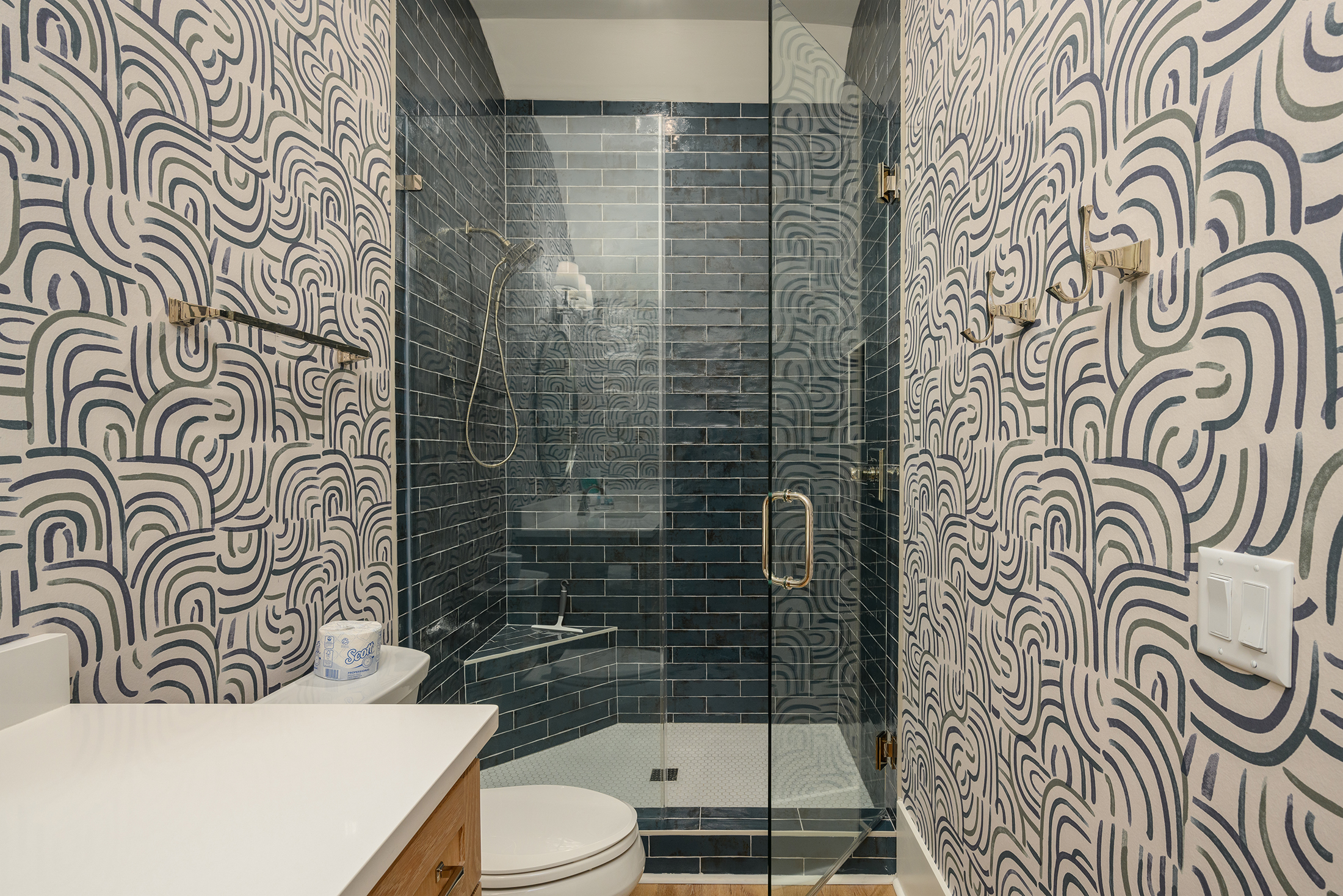 Bathroom over garage serving King bedroom and twin beds over garage