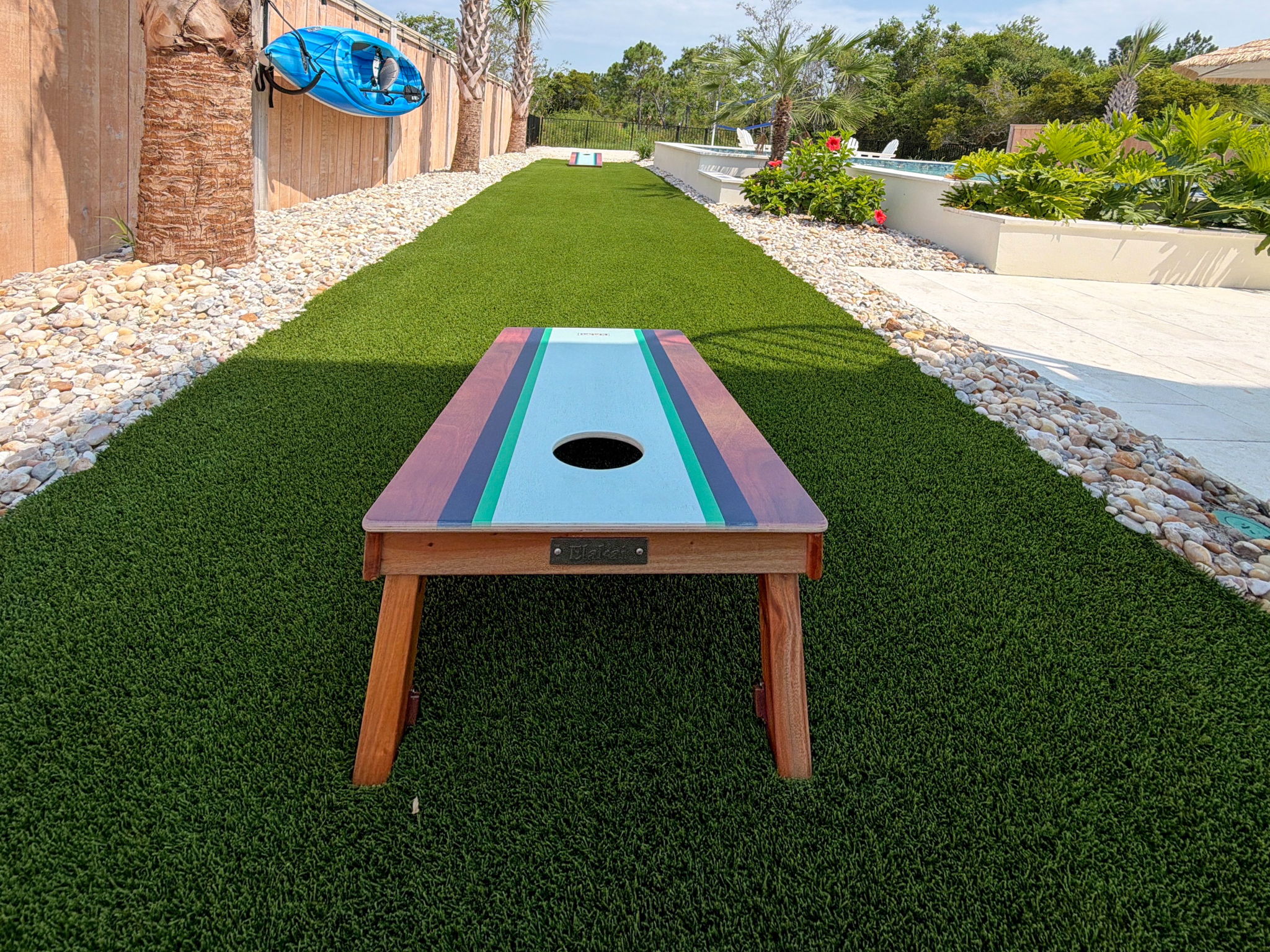 Cornhole and lawn-game space add another easy way to hang out and play right at the house.