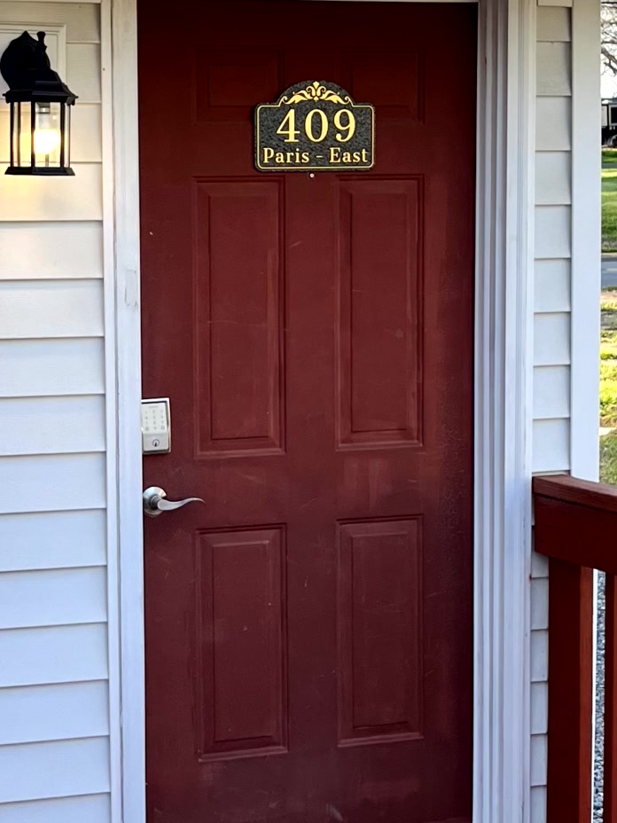 Look for the sign, and use the touchpad to unlock the door.