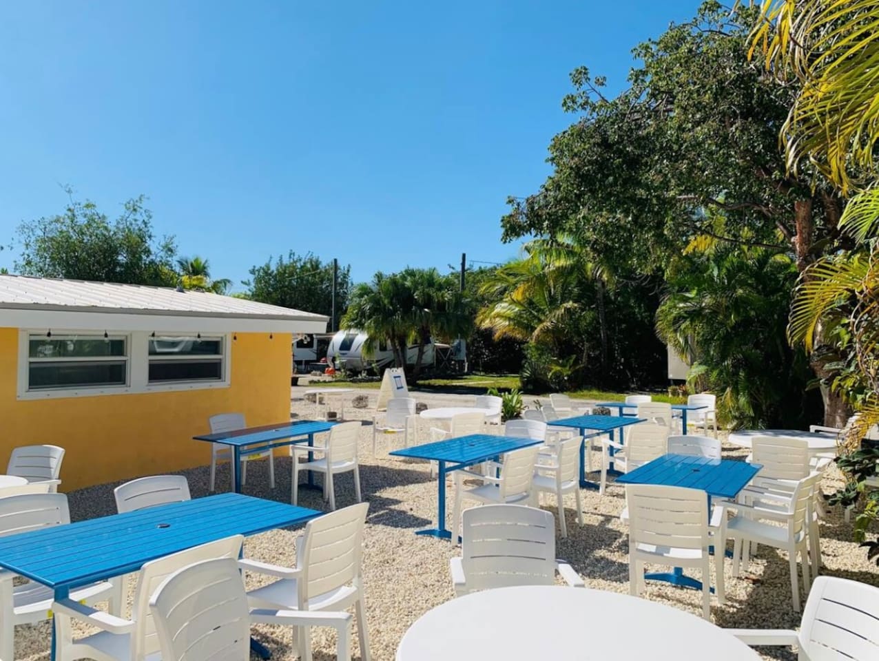 Shared outside seating. Park laundry & bathroom building.