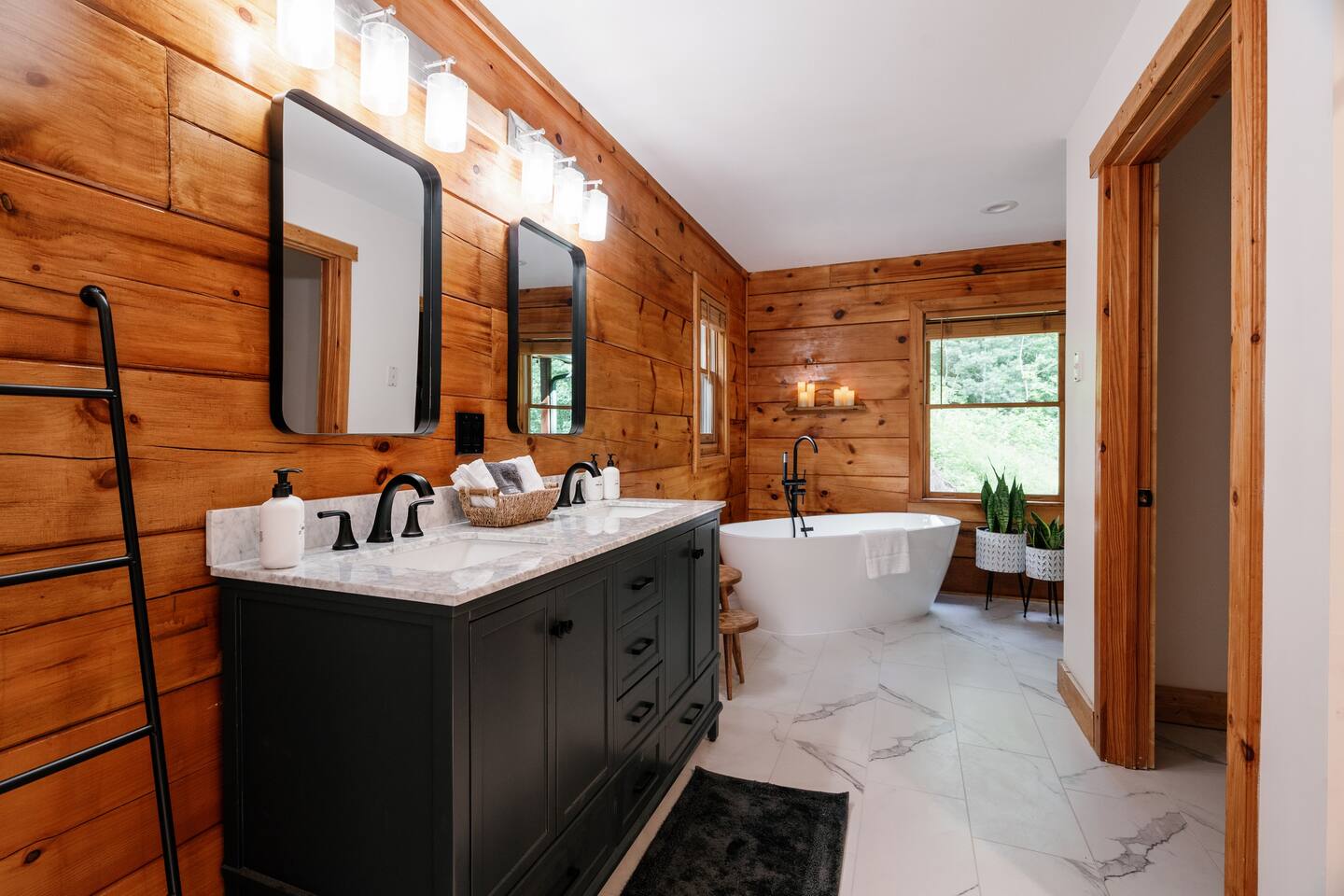 Large ensuite bathroom with walk in shower, soaking tub, and walk in closet. 
