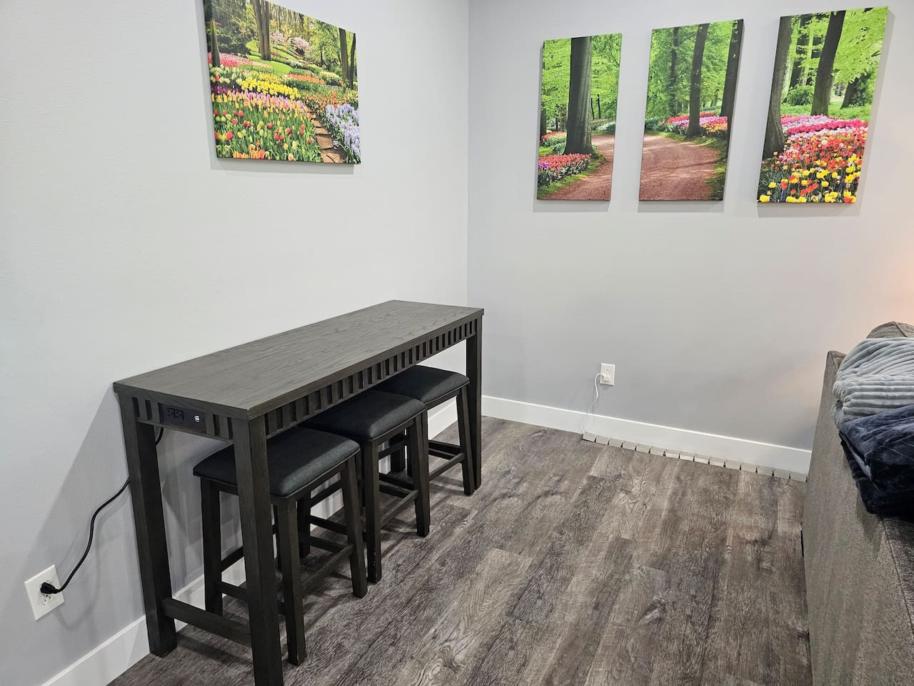 Convenient bar‑height table with built in power - perfect for a dedicated workspace during your stay.
