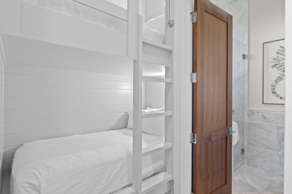 Bedroom 4 (Second Floor): King bed and twin-over-twin bunk bed with private bathroom 