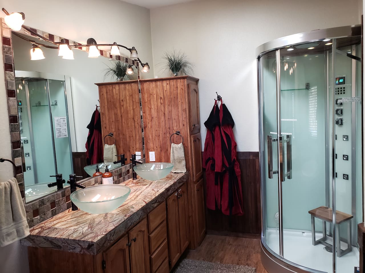 MBA with Steam shower with LED chromatherapy and stereo in the Master Suite, double sinks, and 2 spa robes