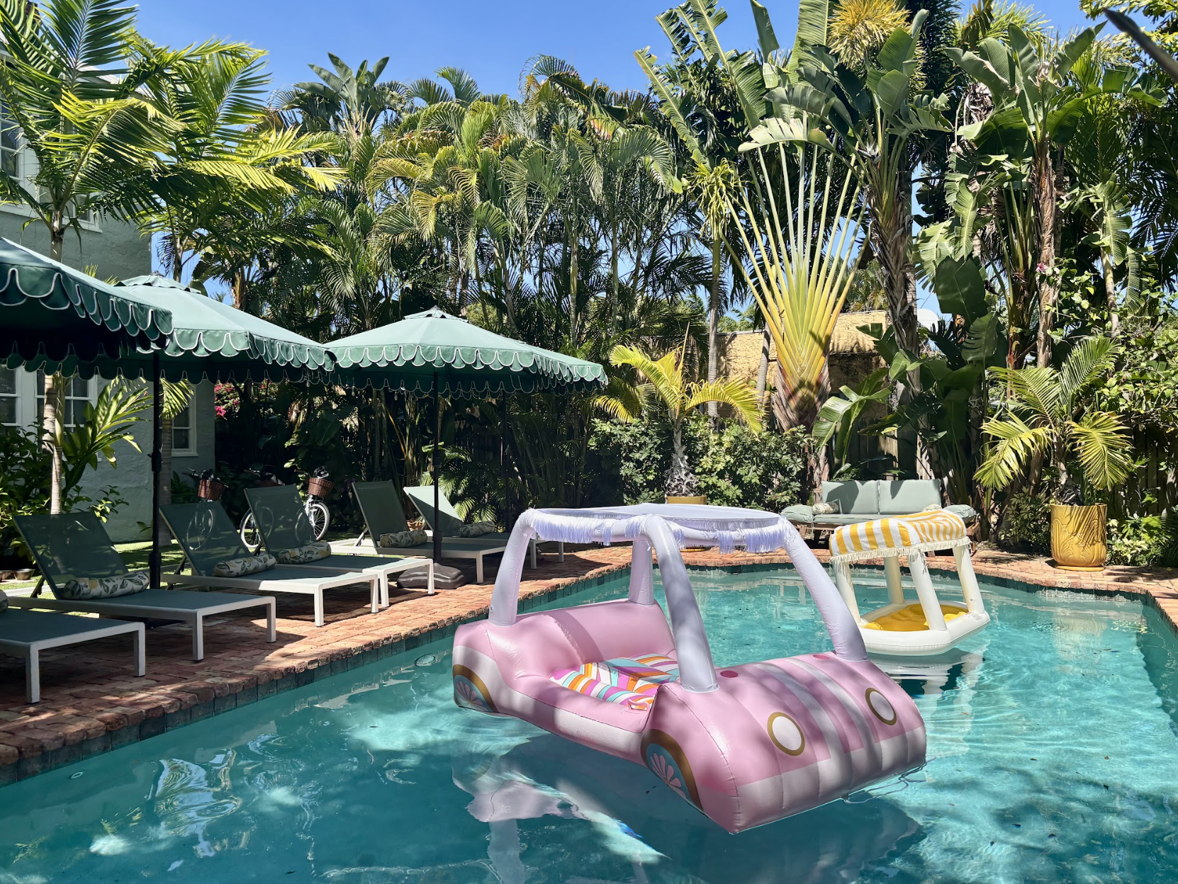 Our idyllic, sun-splashed pool (shared) is right out of a summer dream.