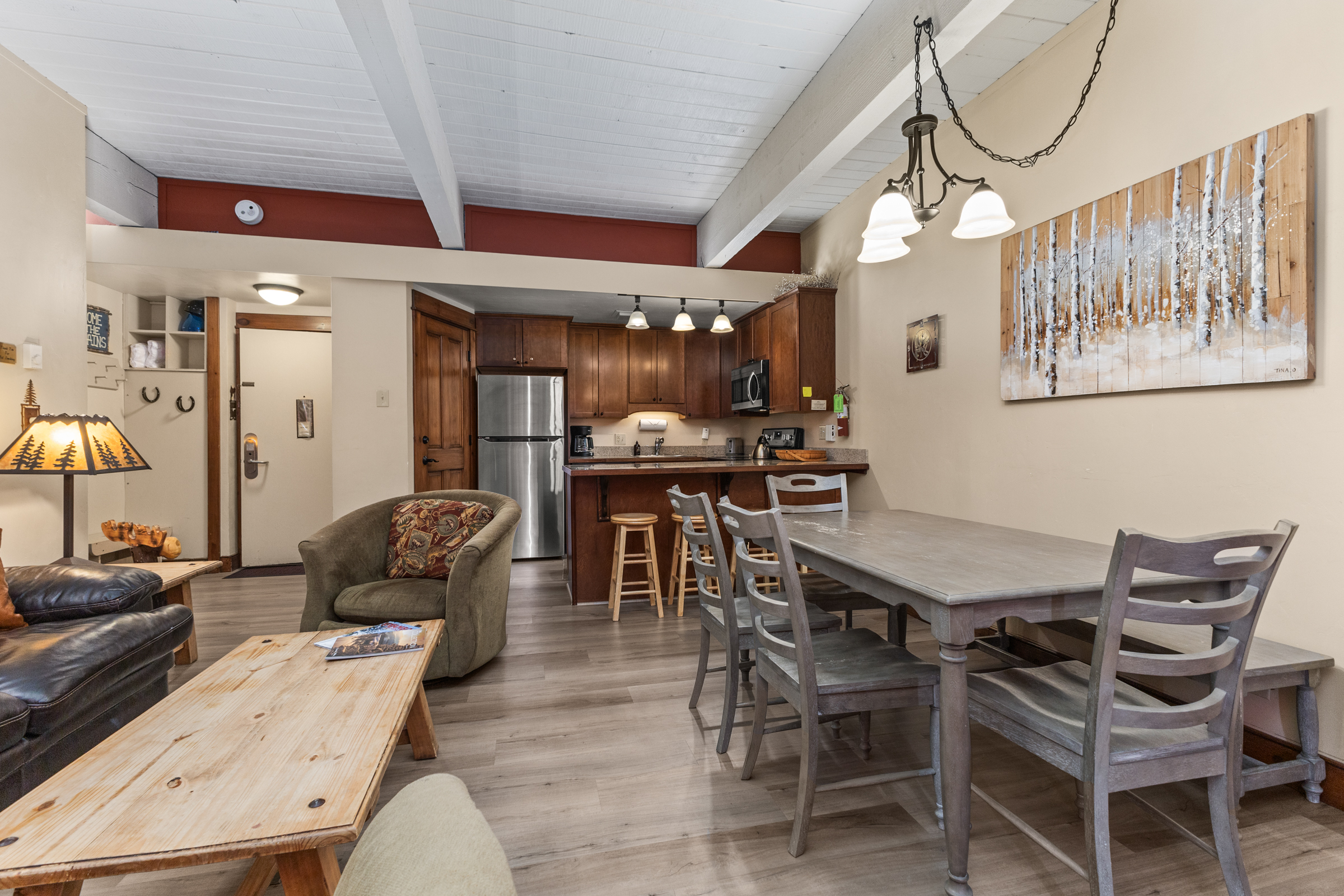 View of Living room into Dining Area and Kitchen