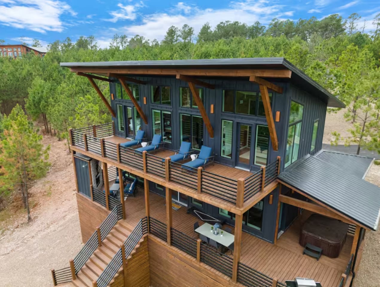 Exterior view of multi-level modern cabin.