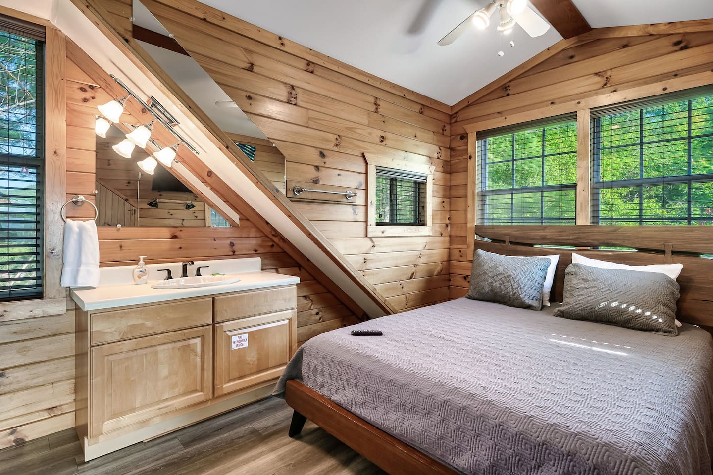 queen bed - sink and toilet - upper level