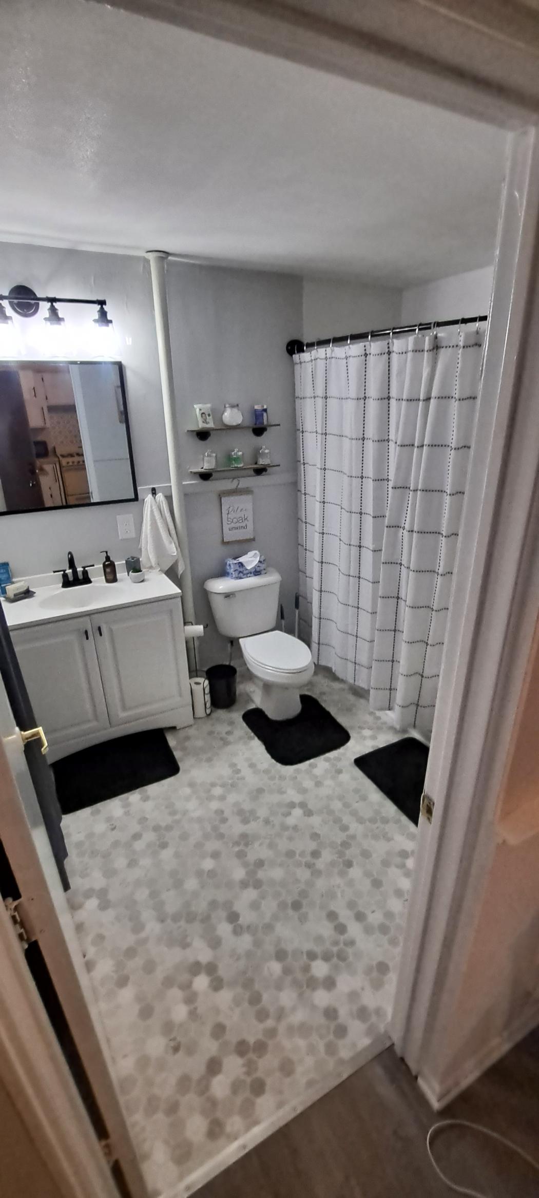 Indulge in comfort—our luxurious bathroom is crafted for ultimate relaxation.