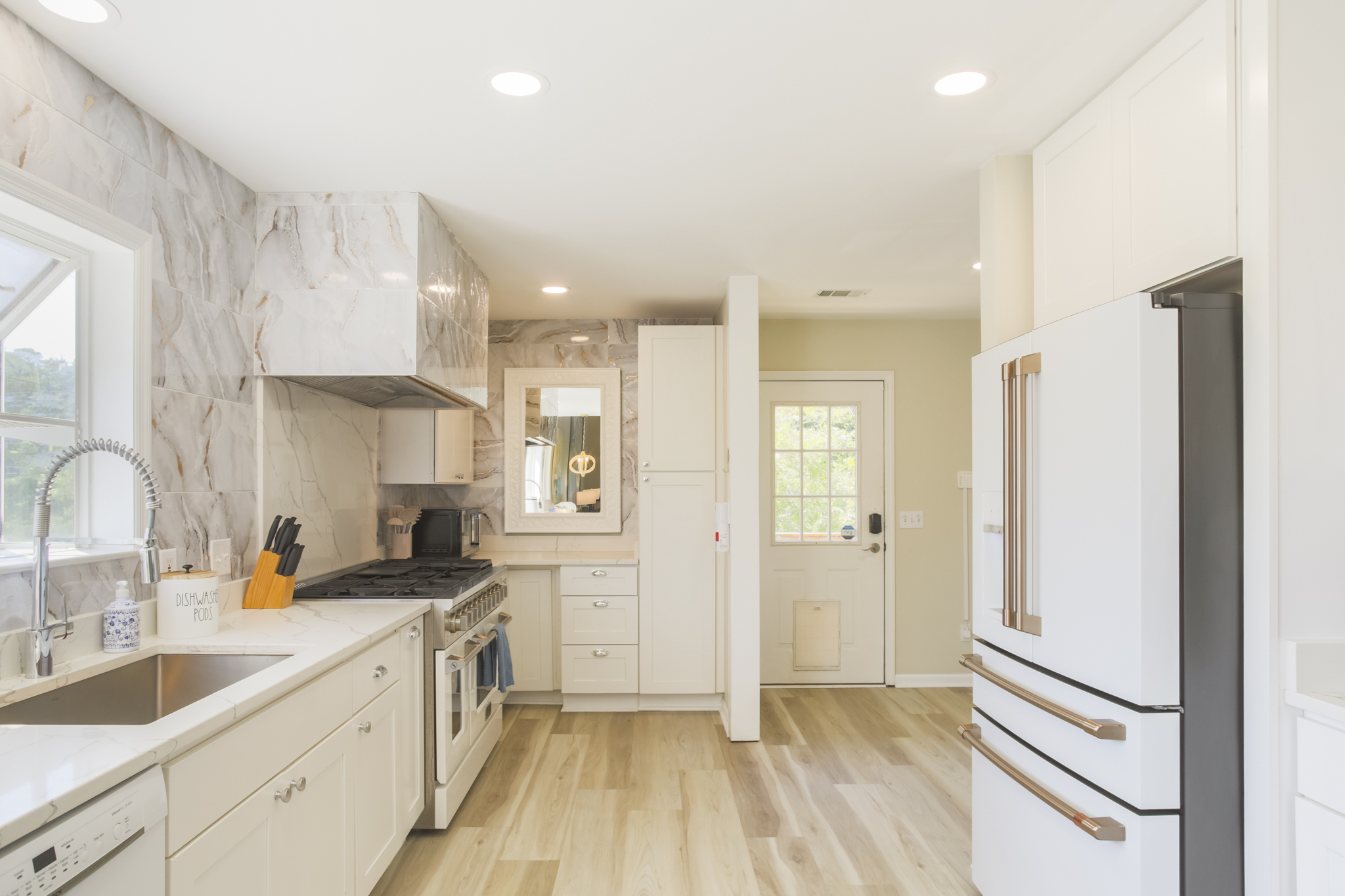 Spacious chef’s kitchen with stainless steel appliances and plenty of counter space.
