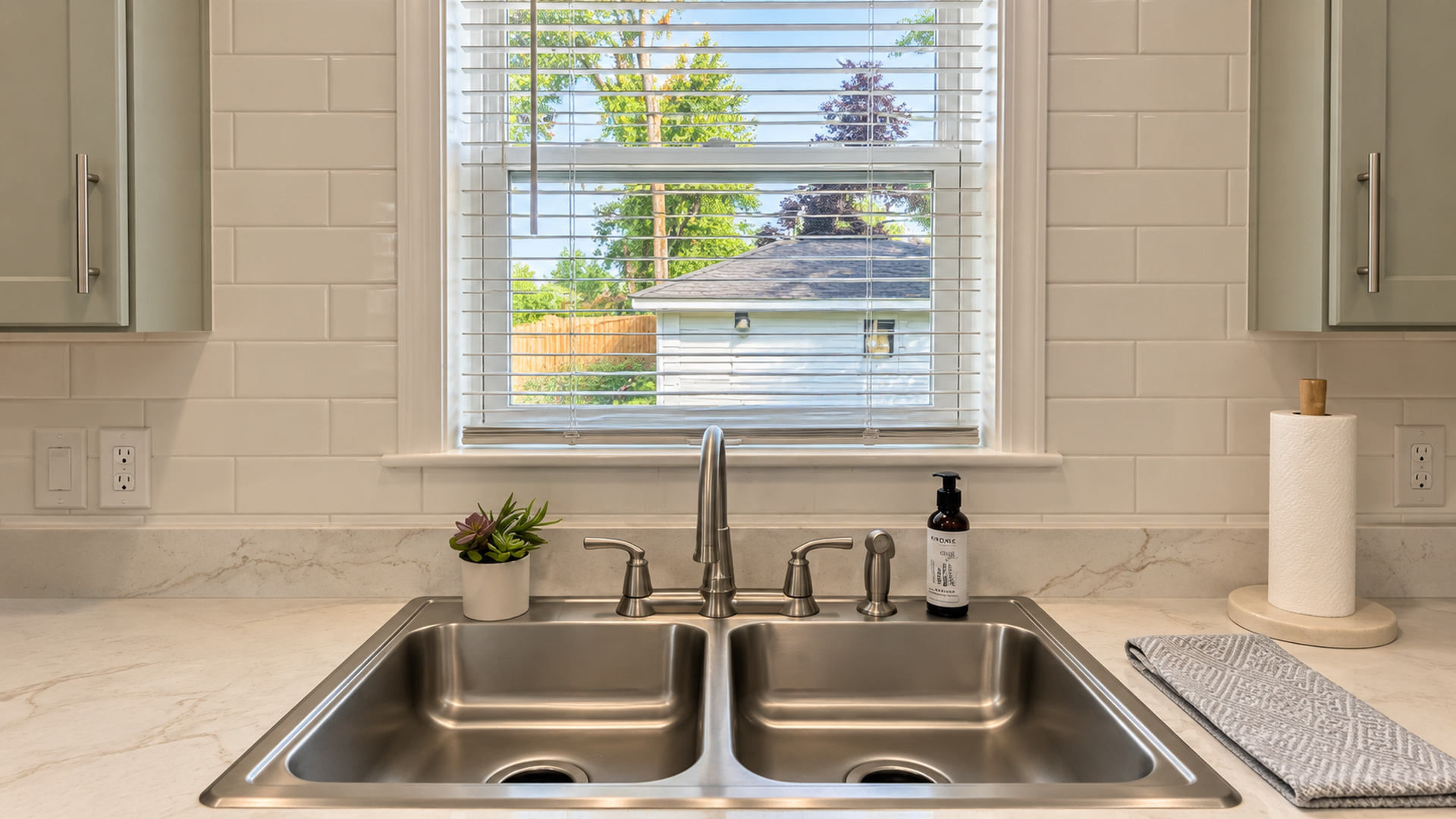Enjoy the convenience of a private garage, visible just beyond the kitchen window.