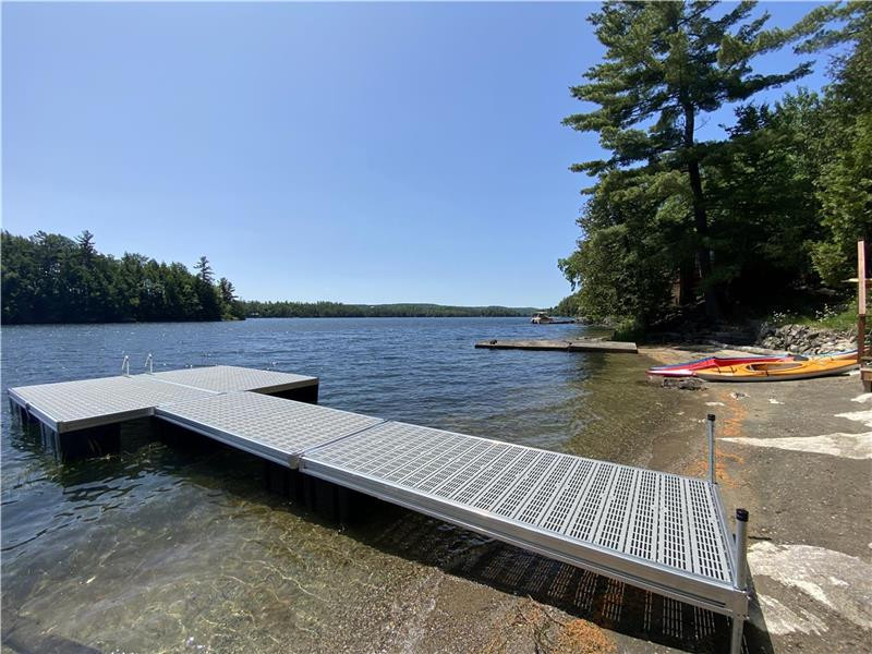 Dock and beach with westward view of Lac McGregor.
