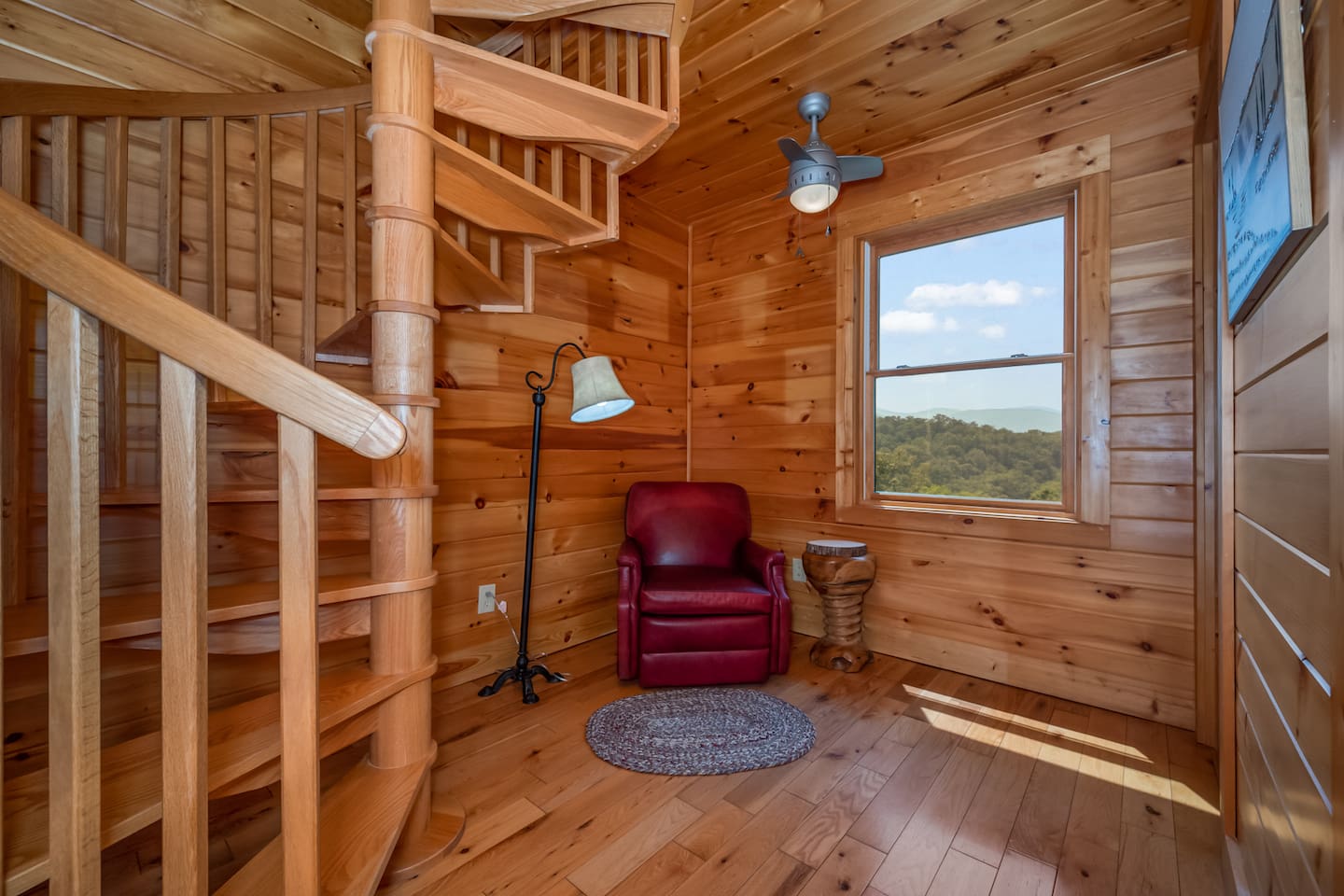 Private sitting area in loft #2 with spiral staircase leading to "perch"!
