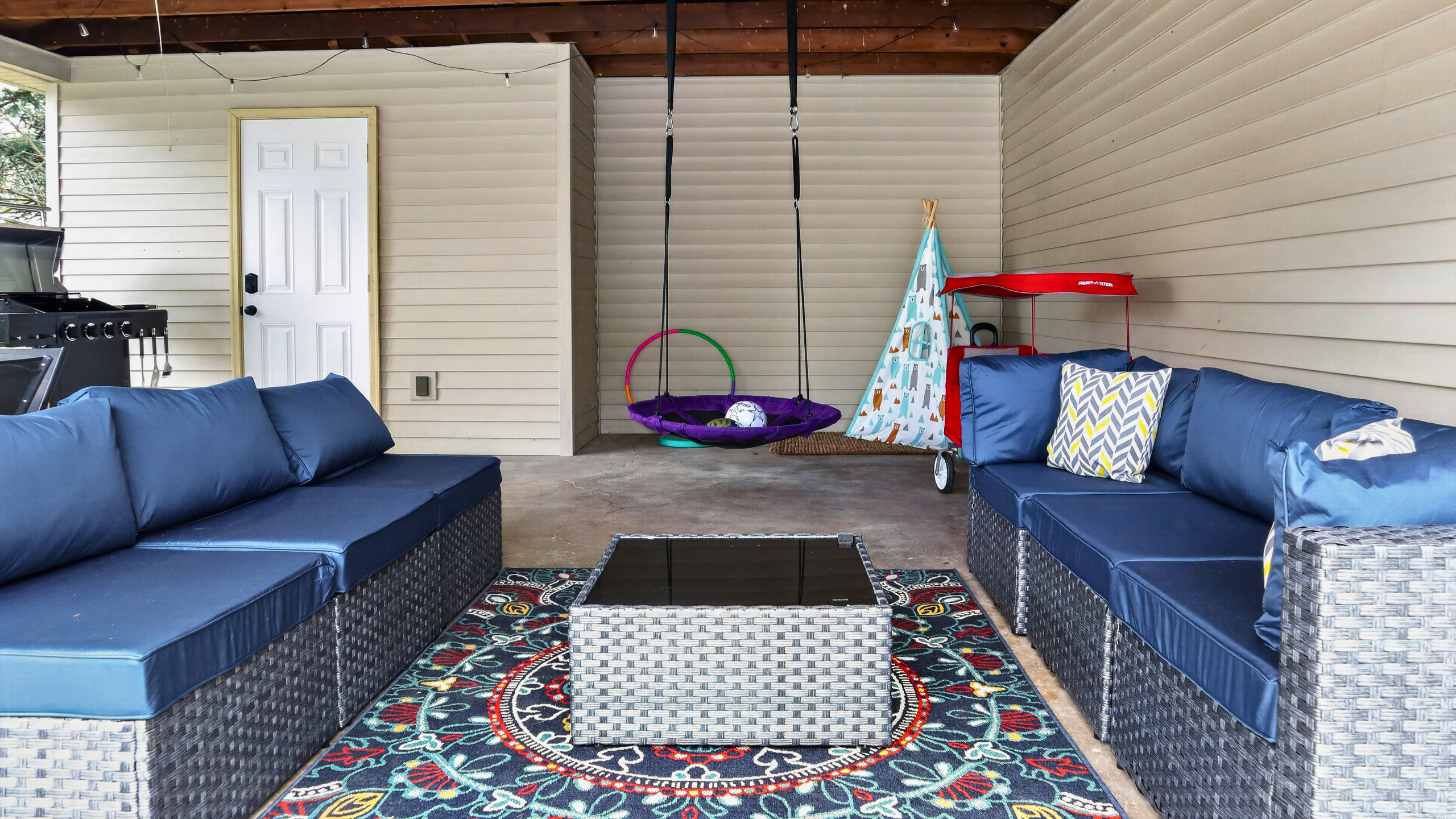 Comfortable lounge seating and a family-friendly play space create a favorite gathering spot for all ages.