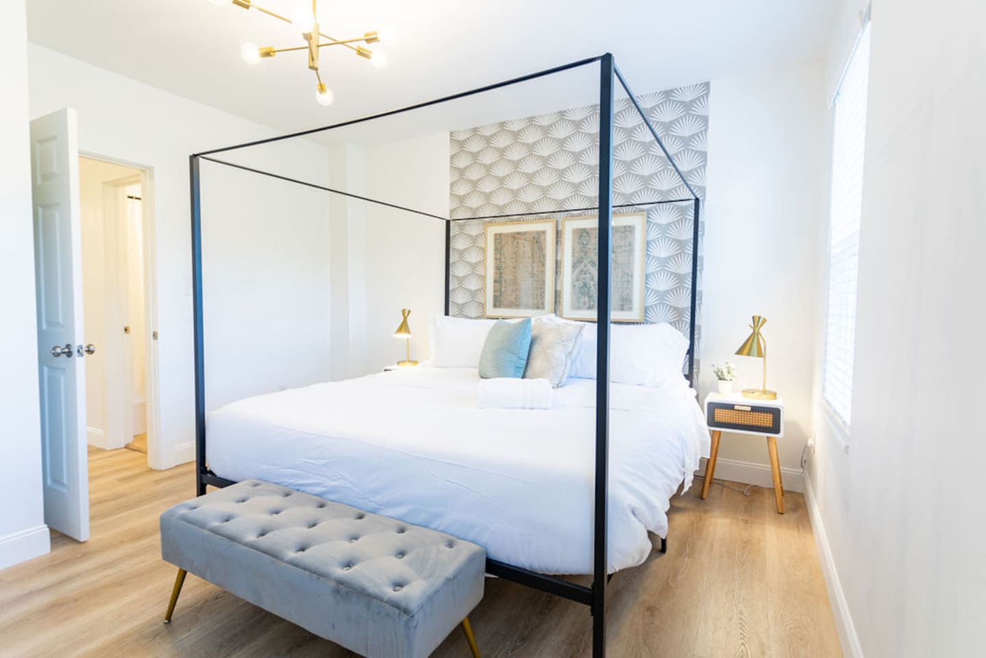 Luxurious king-sized bedroom featuring a unique, eye-catching bed frame for a stylish and comfortable stay.