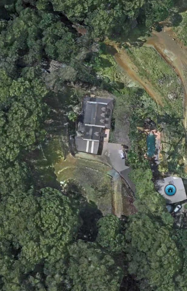 The dam is at the bottom of this picture, next to the main house. The caretakers cottage is the blue dot. 