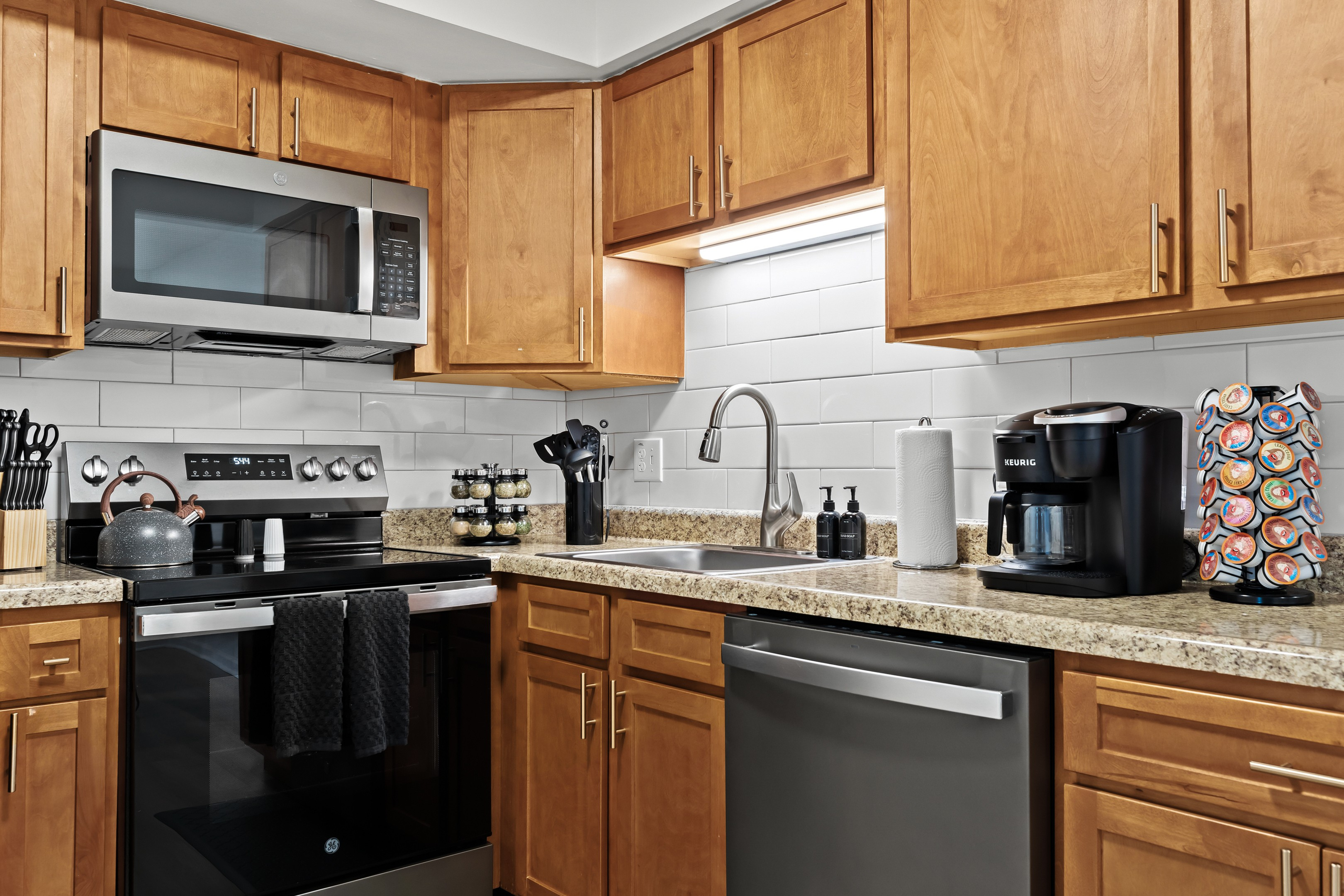 Fully equipped for convenience—enjoy a full knife set, spices, and cooking essentials at your fingertips.