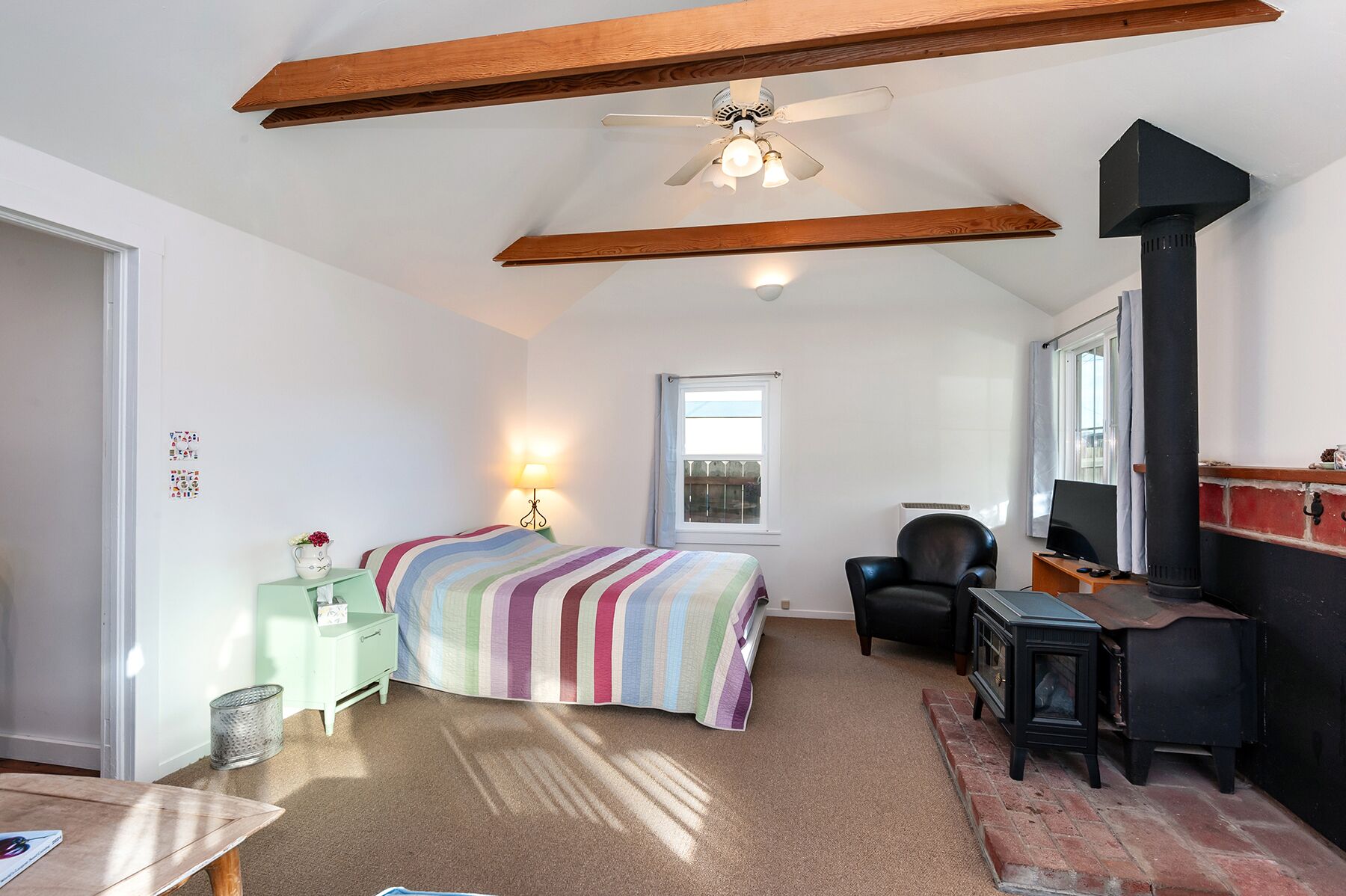Living Room - Queen bed w/ electric fireplace