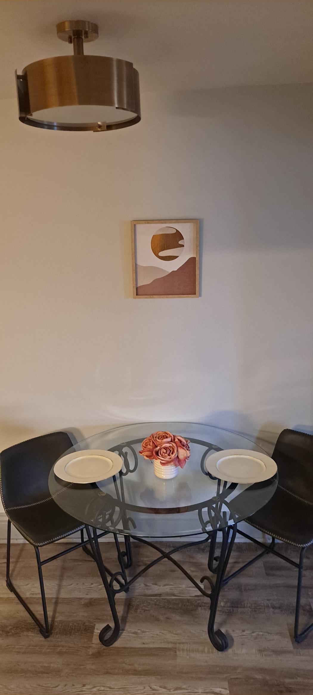 Stylish and efficient—equipped with everything you need to prepare a delicious meal. Features include a stainless steel refrigerator, stove, coffee maker, kitchenette oven, and a cozy eating a