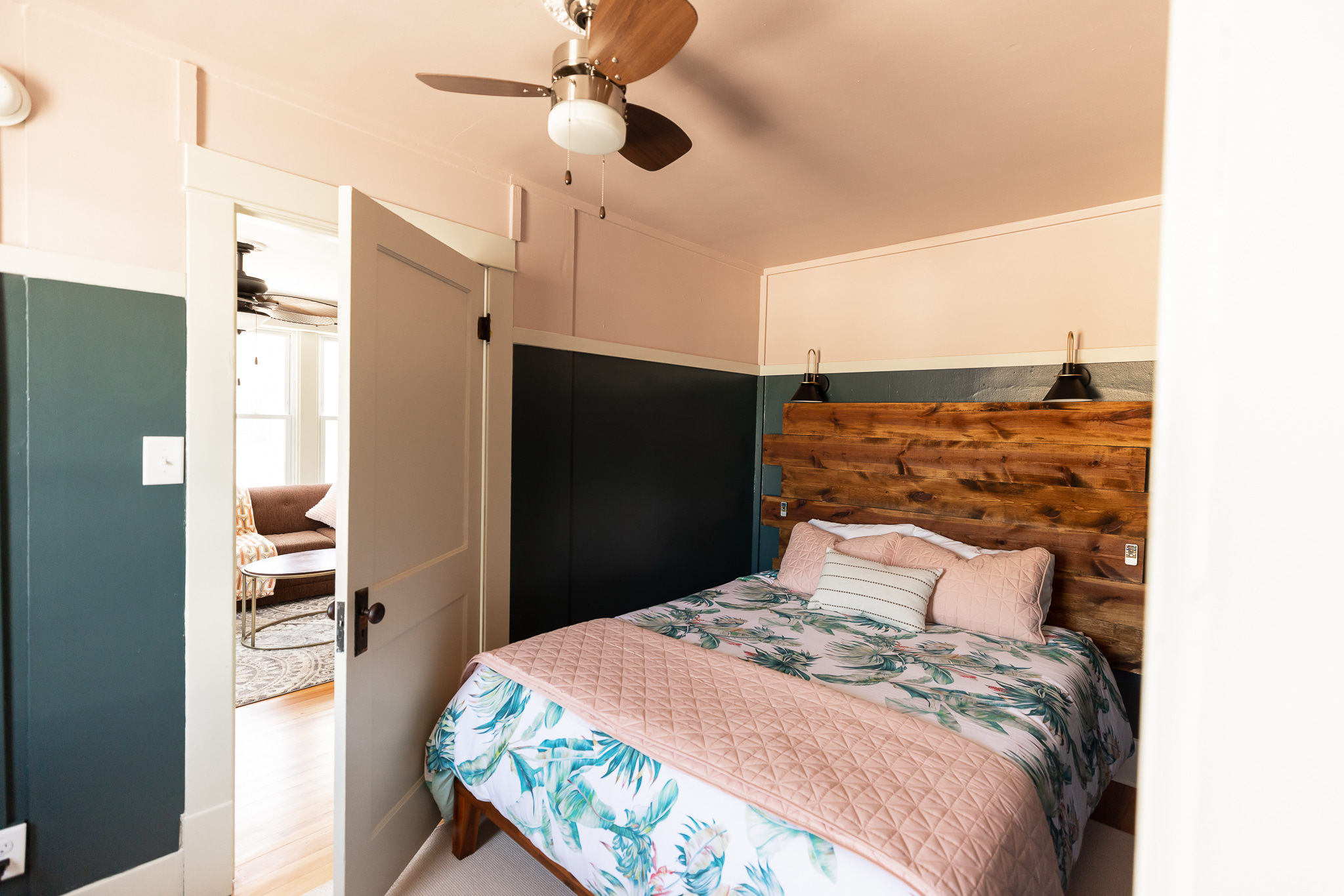 Same bedding setup as the larger back room, in order to fit the queen bed, the door does not open ALL the way. The hardware is original and does not always latch.
