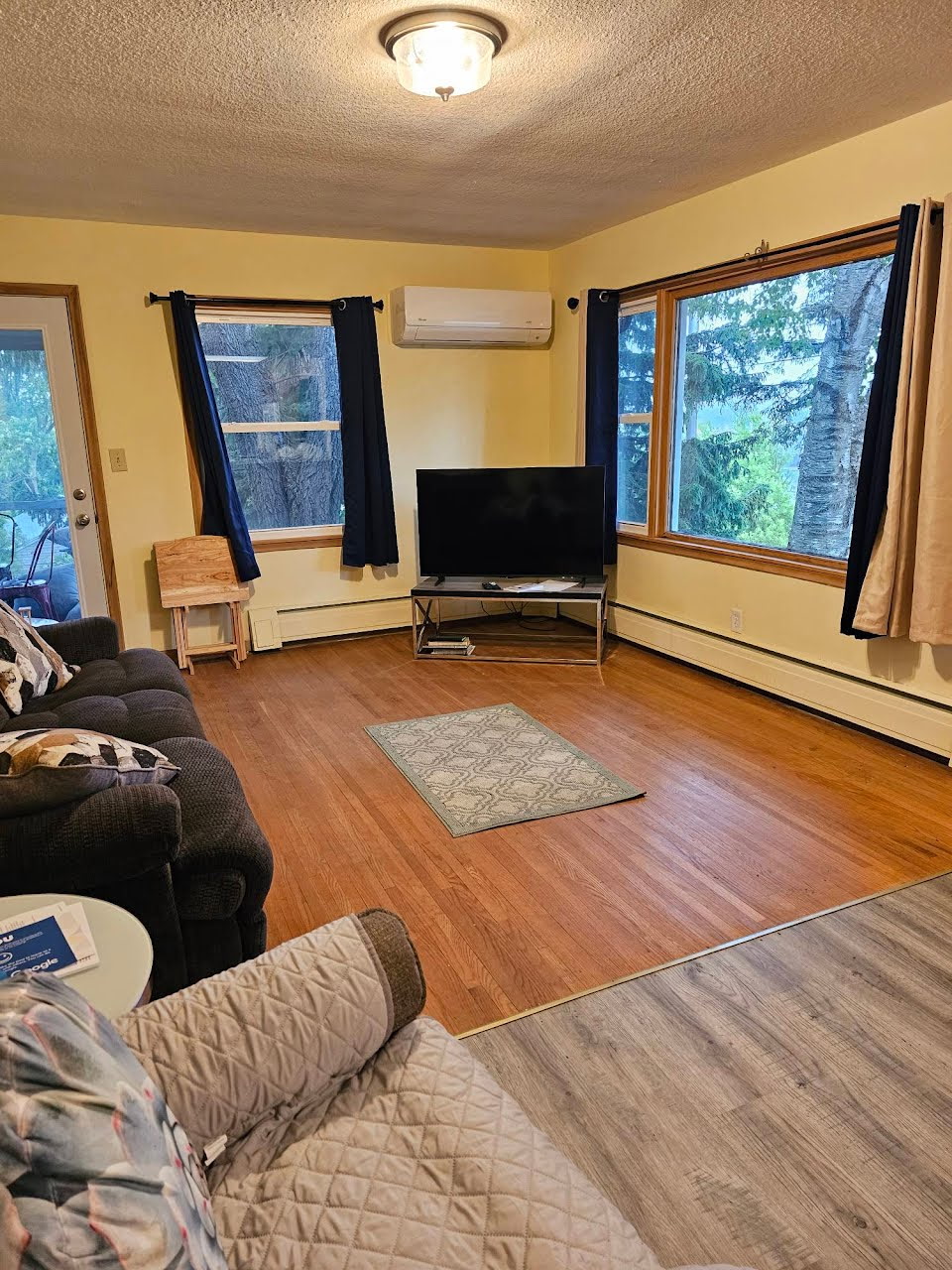 Roku smart TV, couch, recliner, and access to 3 season porch