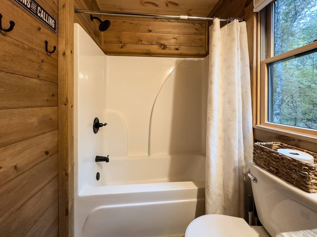 Step into our immaculate bathroom area, where cleanliness reigns supreme, offering a refreshing oasis for relaxation and rejuvenation after a day of adventure