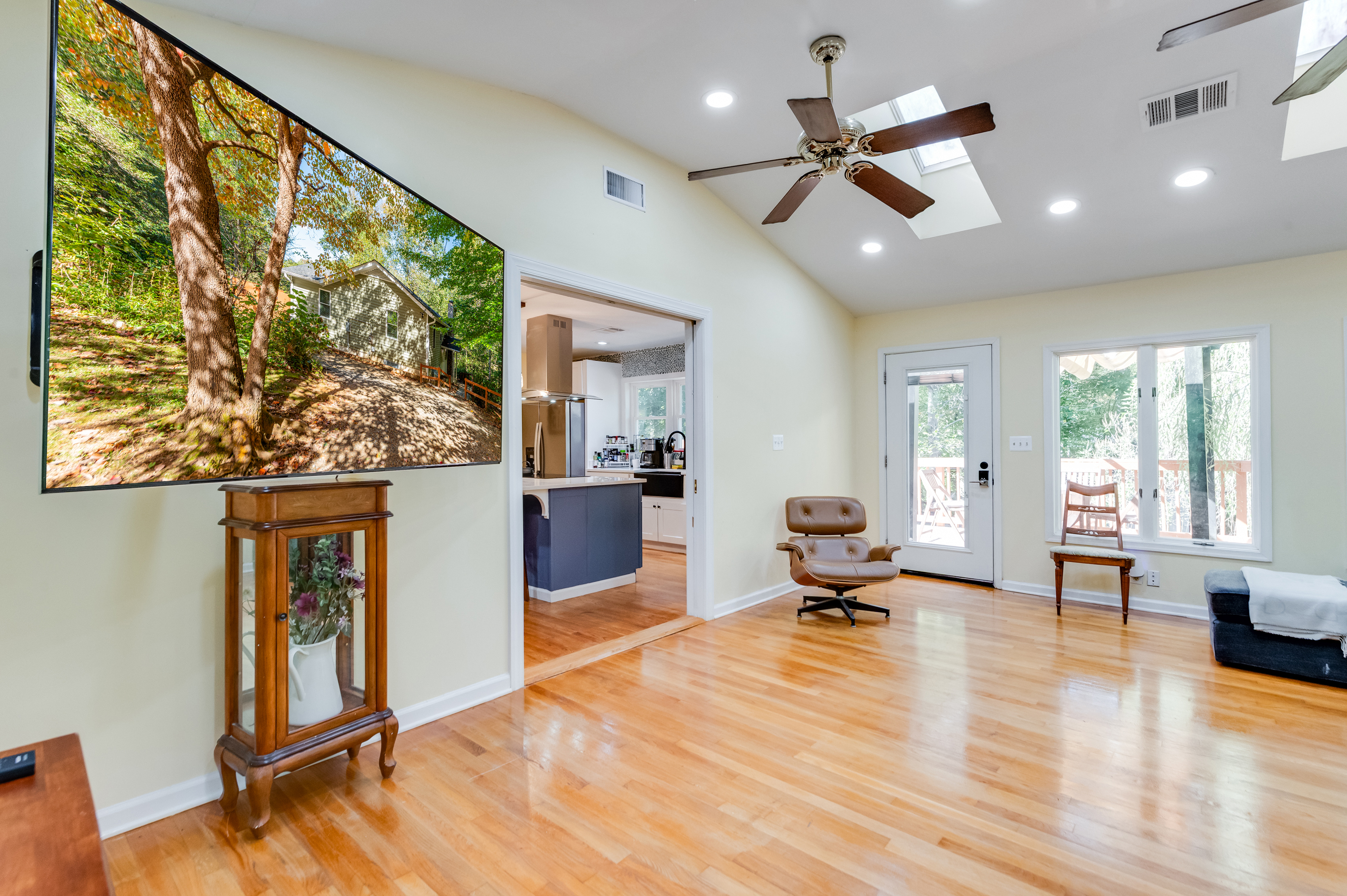 Living Room: Bright and airy space with sleek furnishings and a captivating view of nature!