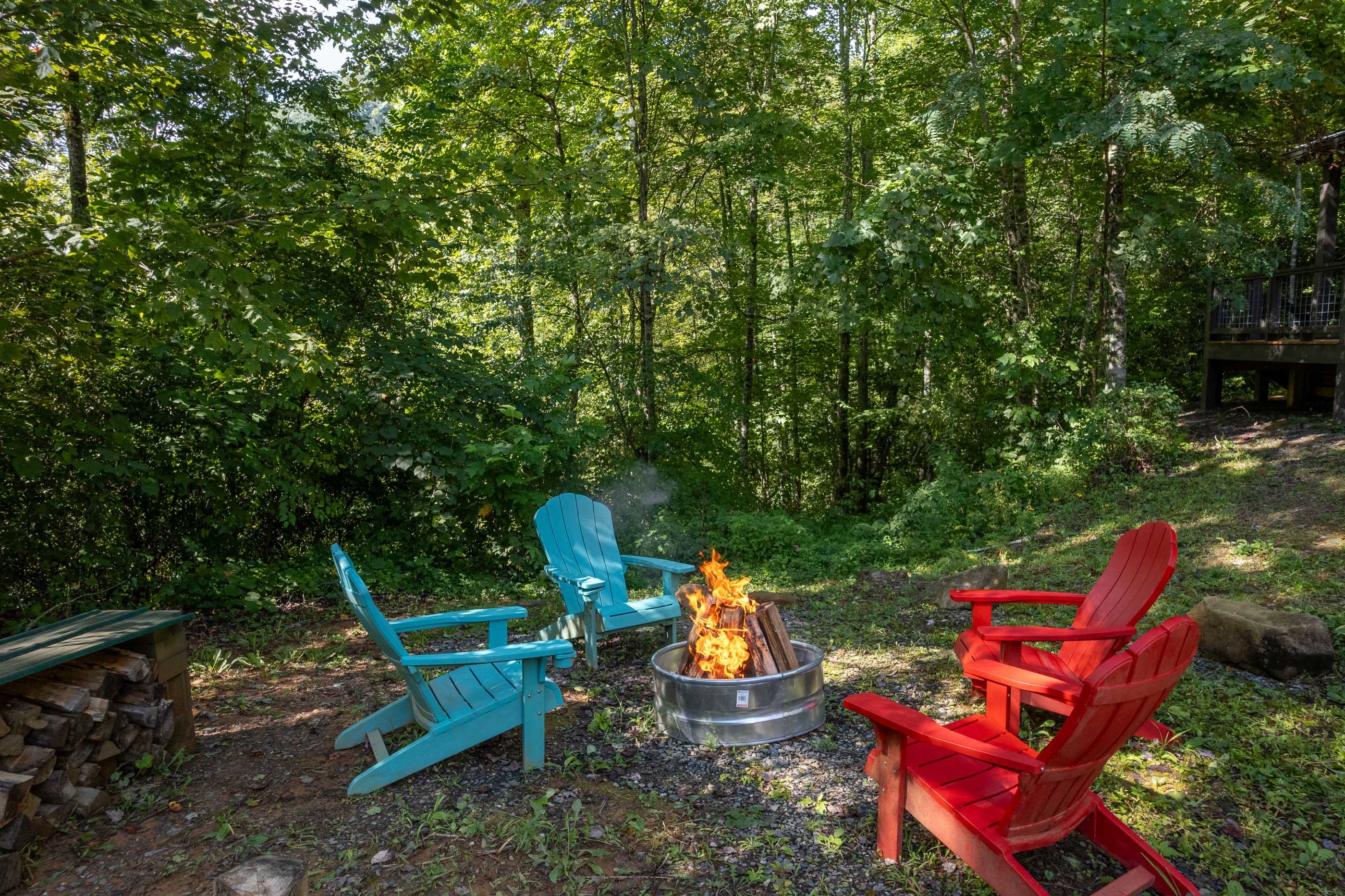 End your day fireside—Adirondack chairs, mountain air, and a sky full of stars.