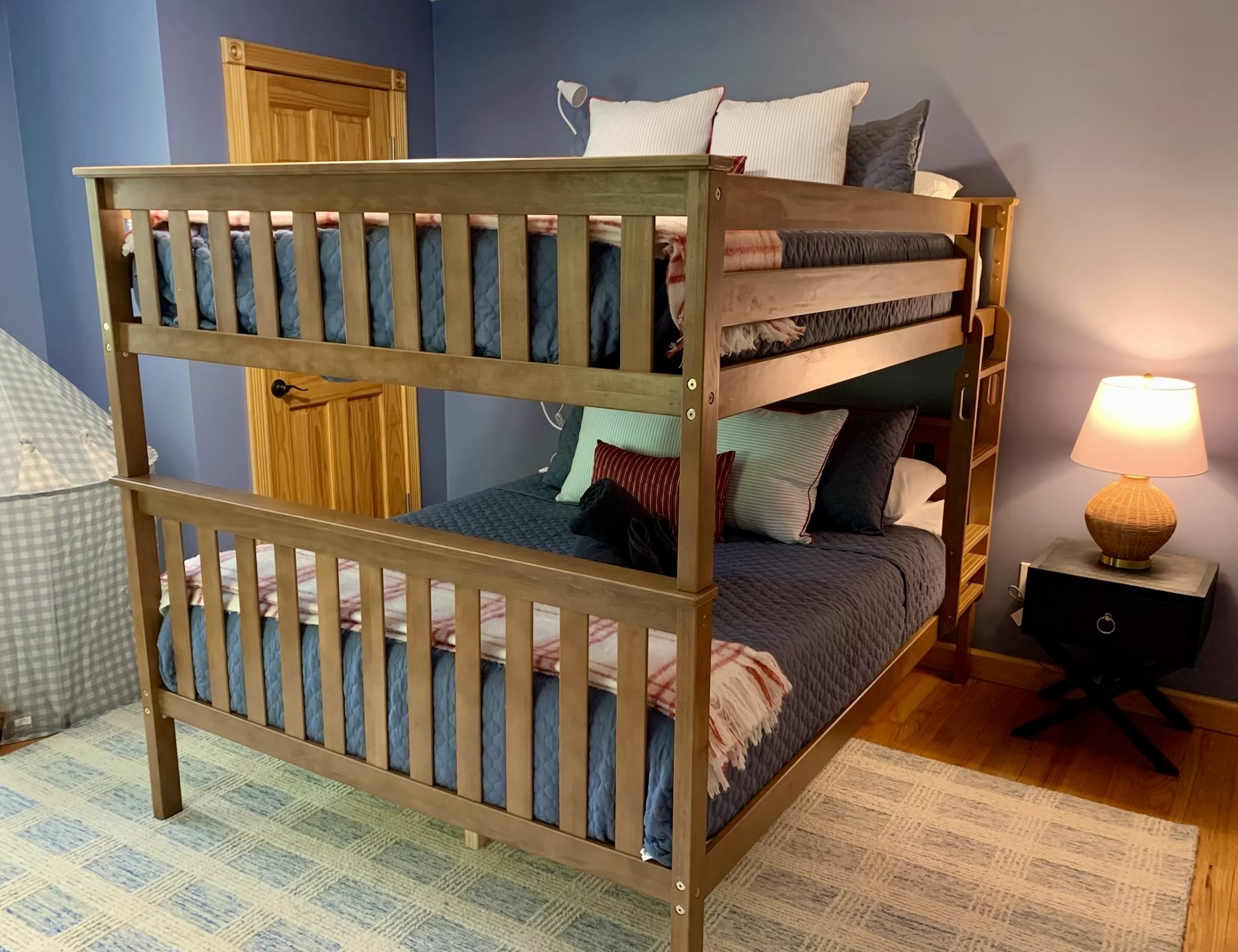 Rare queen-over-queen bunk beds provide generous sleeping space for kids, teens, and adults alike.