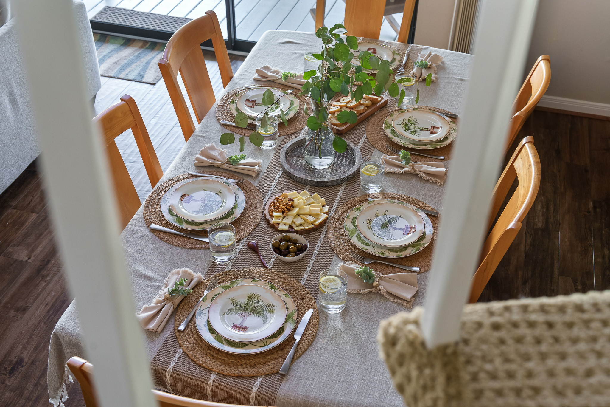 Gather for good food and even better company at this welcoming table, set with care and charm. Whether you’re sharing stories over snacks or sitting down for a family-style meal, this space is made for connection and comfort.