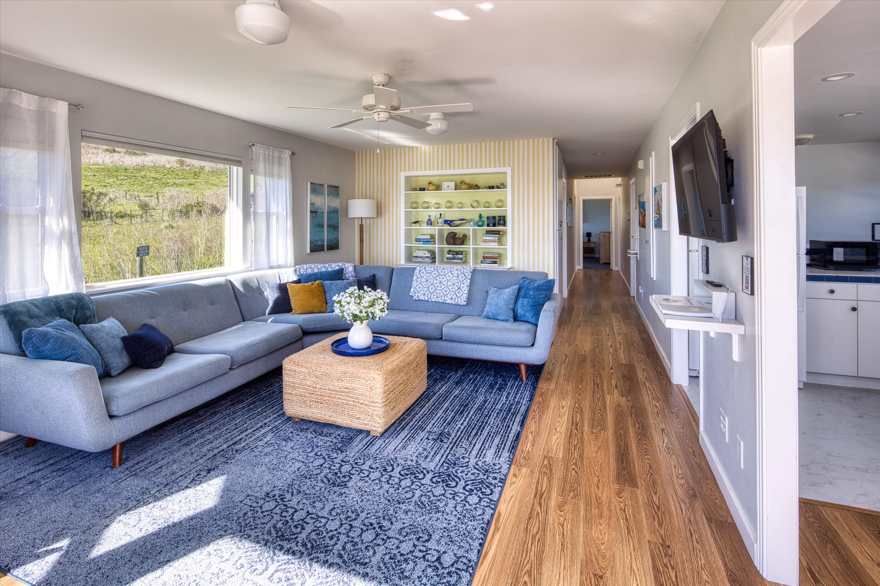 Right on in from the front door to viewing the whole house-Kitchen & dining on the right, Living room on the left, and bedrooms down the hall.