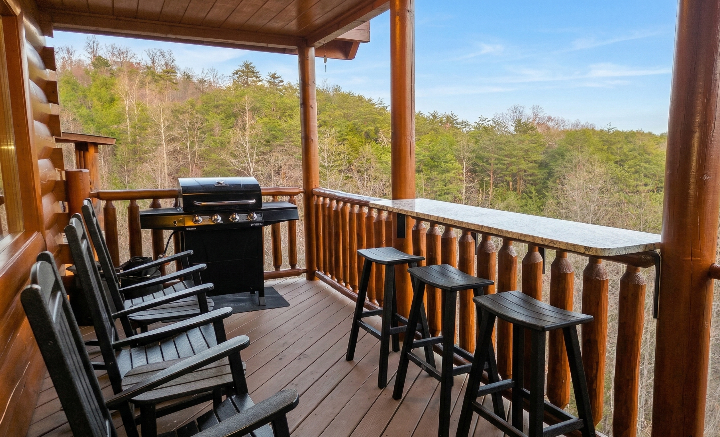Stretch out on the main deck with rocking chairs, a grill, and a deck bar. An inviting outdoor space for morning coffee, family meals, and quiet evenings.