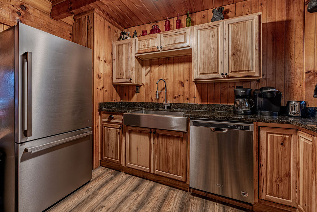 Full kitchen with stainless steel appliances