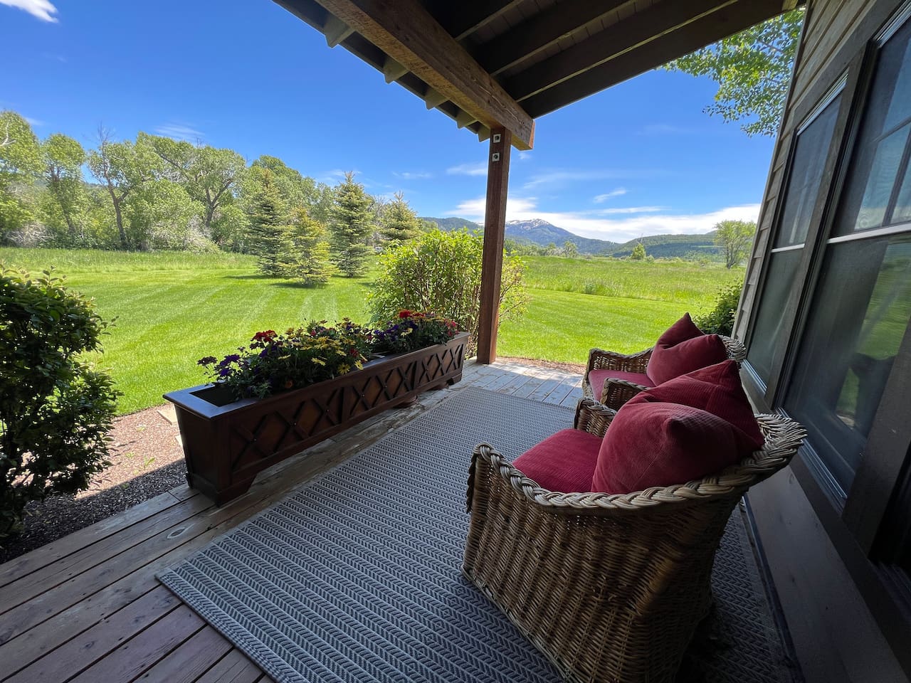 Unobstructed south facing view from the back deck with maintained yard and no neighbors