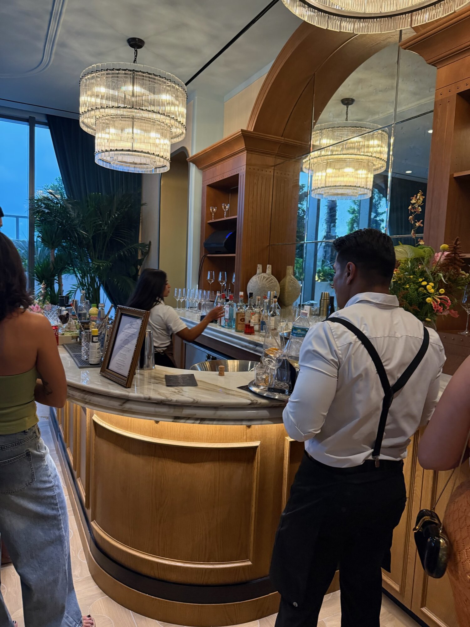 Speakeasy lounge bar — curated cocktails inside the hidden bookcase entrance