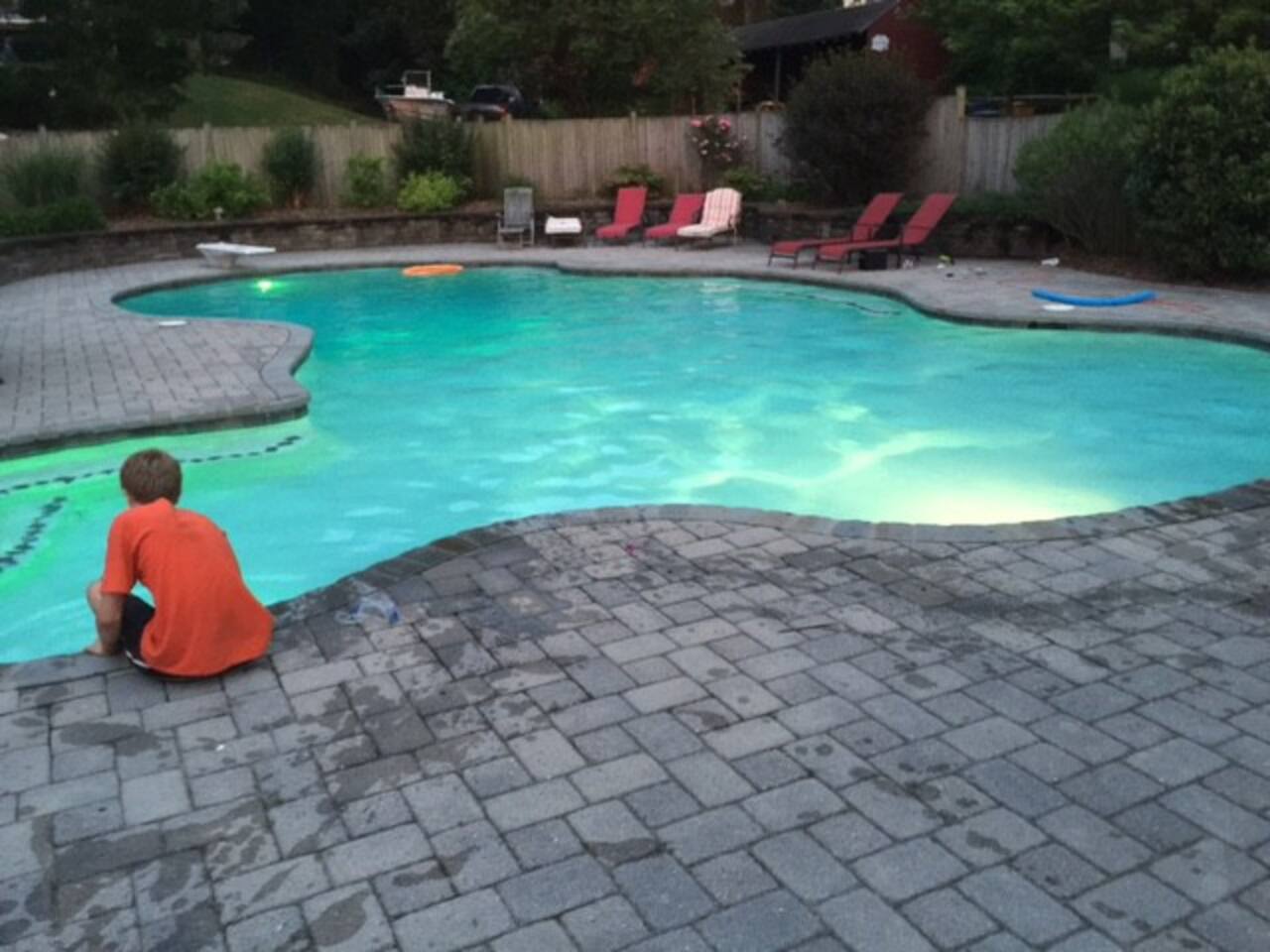 Pool view showing lights that can be turned on at night