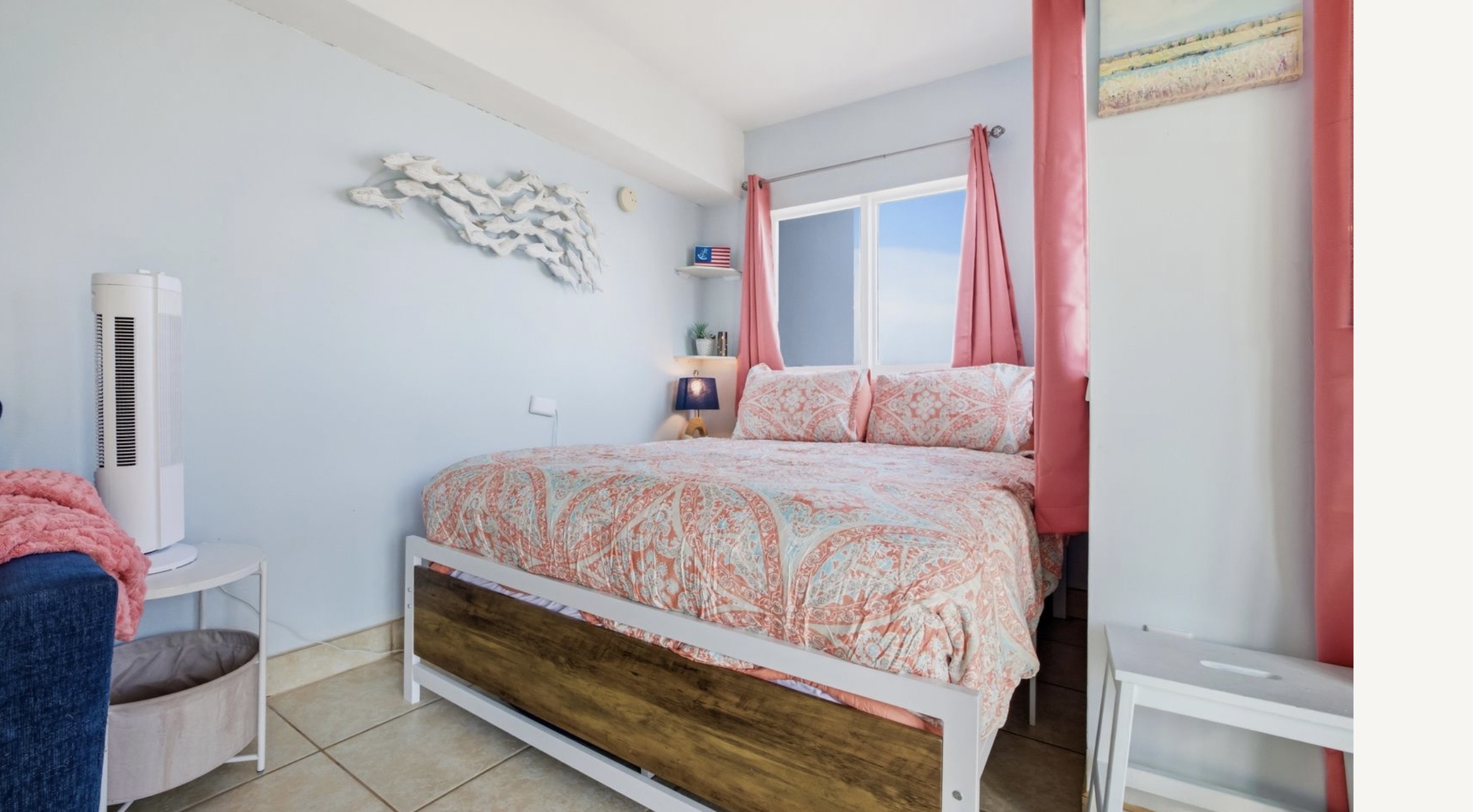 Rest easy in a cozy queen bed styled for comfort, calm, and romance. Soft bedding, peaceful coastal colors, and oceanfront window views create the perfect place to wake up slowly, sip coffee, and start the day with the sunrise. ⭐